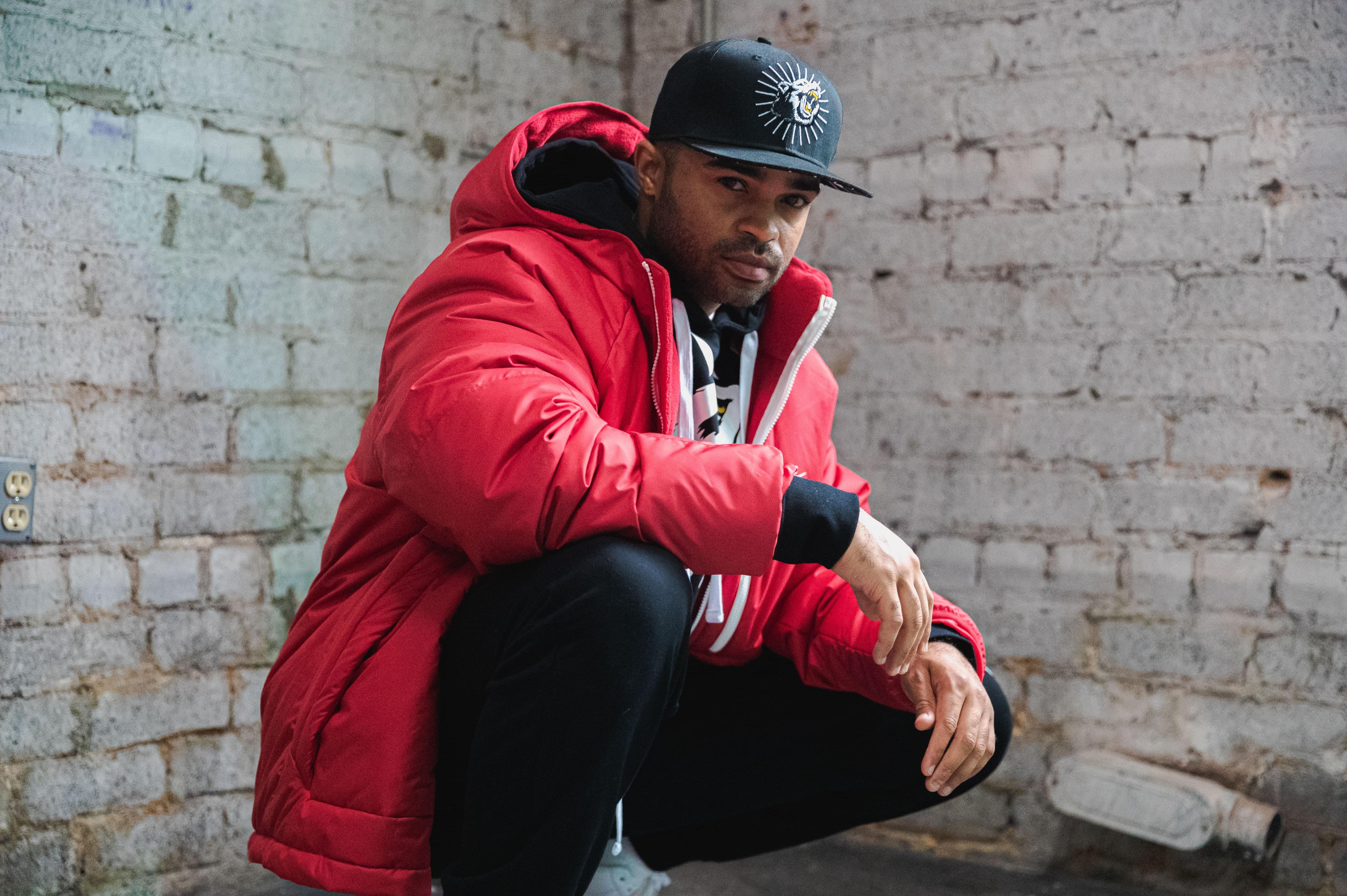 Red Nike Jacket and Men's Black Joggers