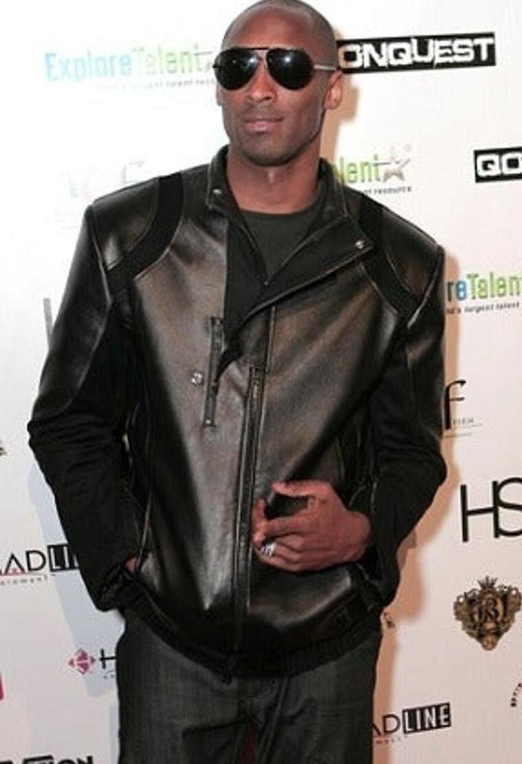 Kobe Bryant on red carpet with black aviators
