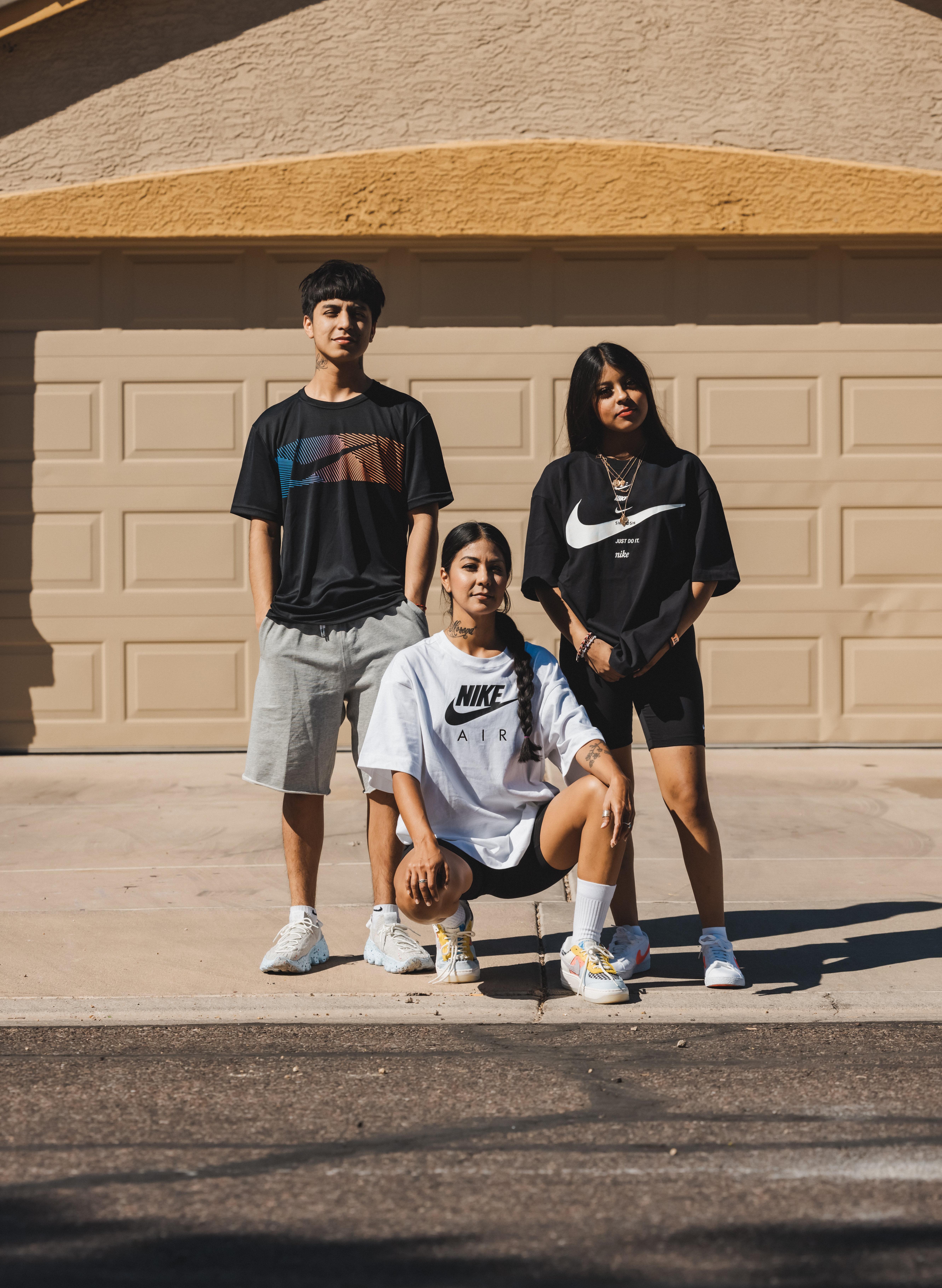 Lucinda with two other people in Nike apparel.