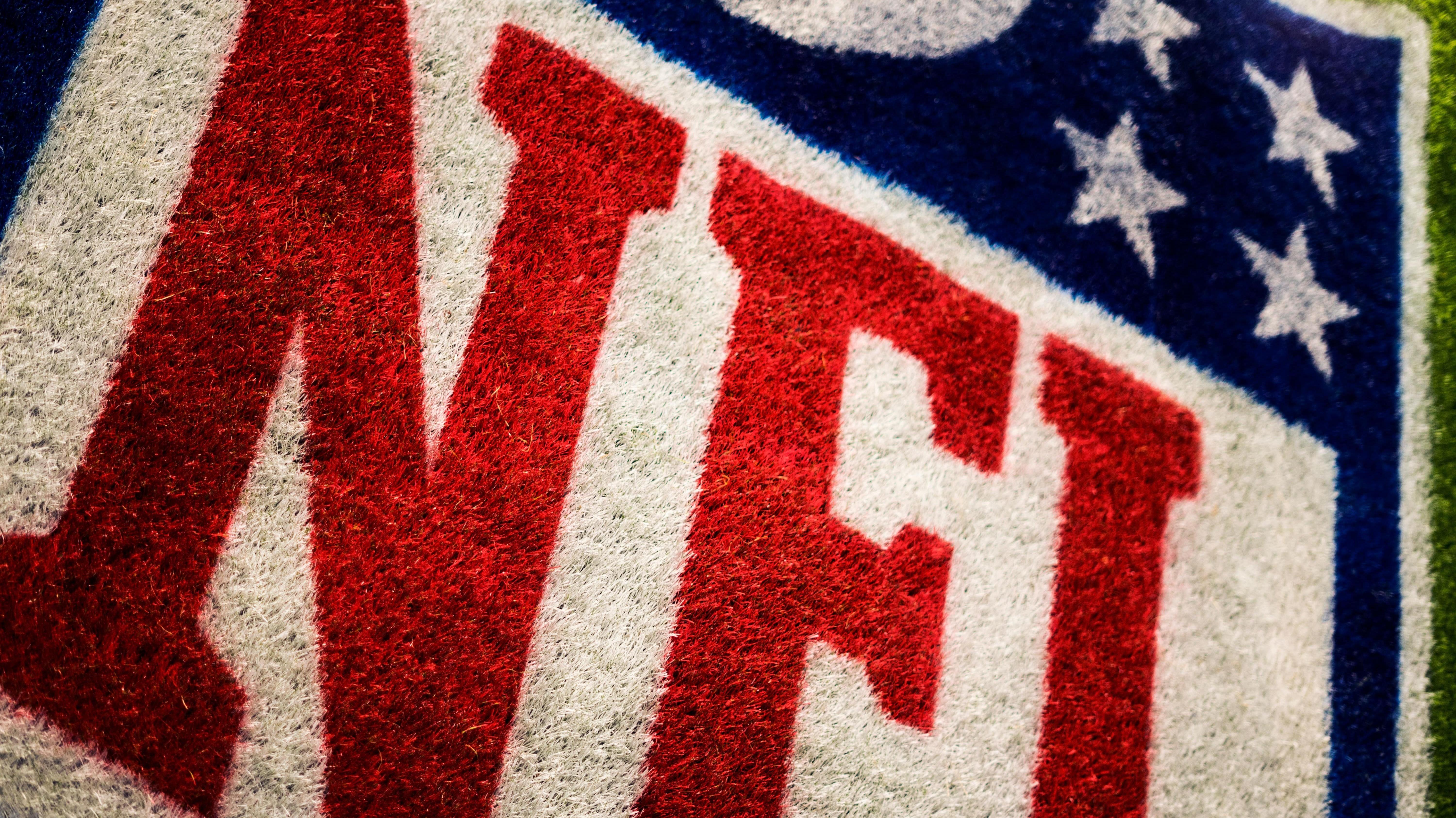 Grass NFL photo by Adrian Curiel on Unsplash