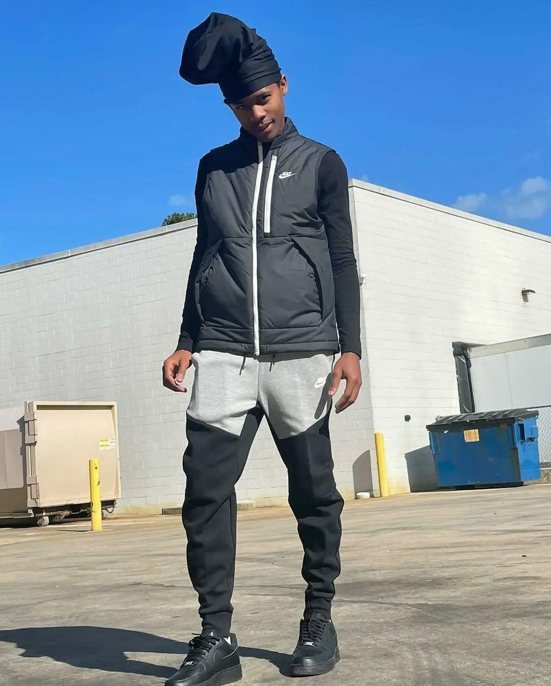 Man in Black Nike Air Force 1