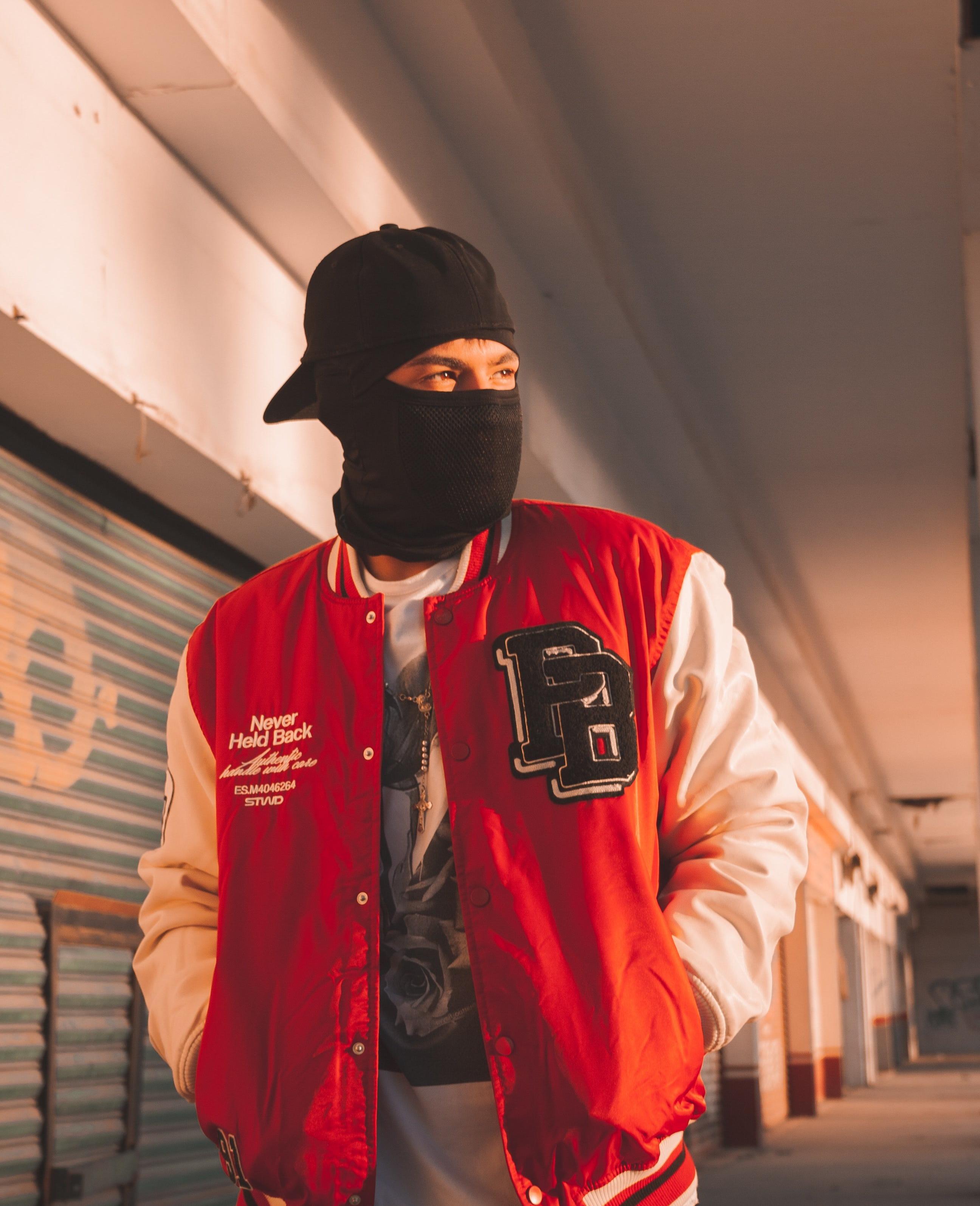 Black Balaclava and Red Varsity Jacket