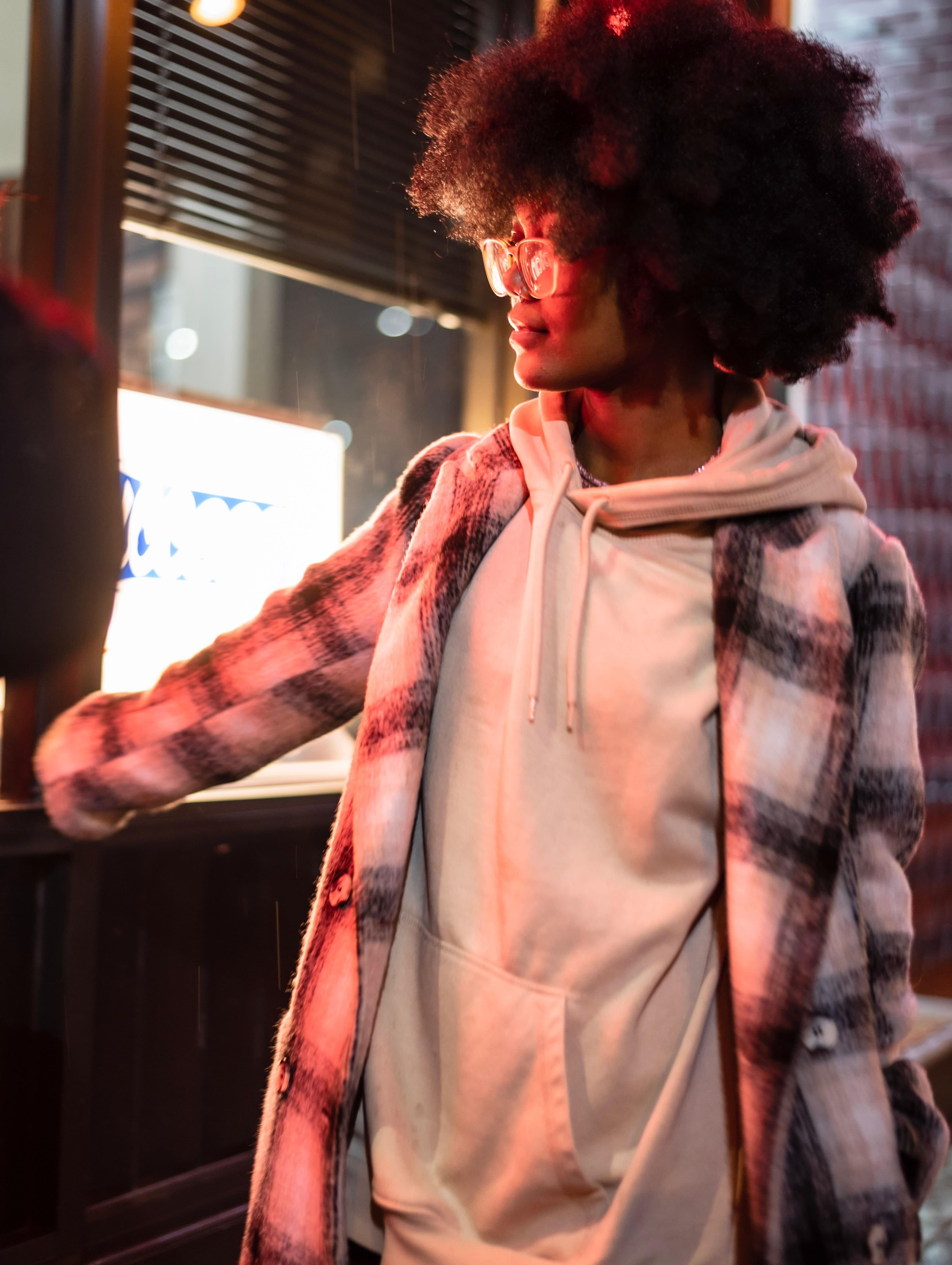Woman in hoodie and shacket