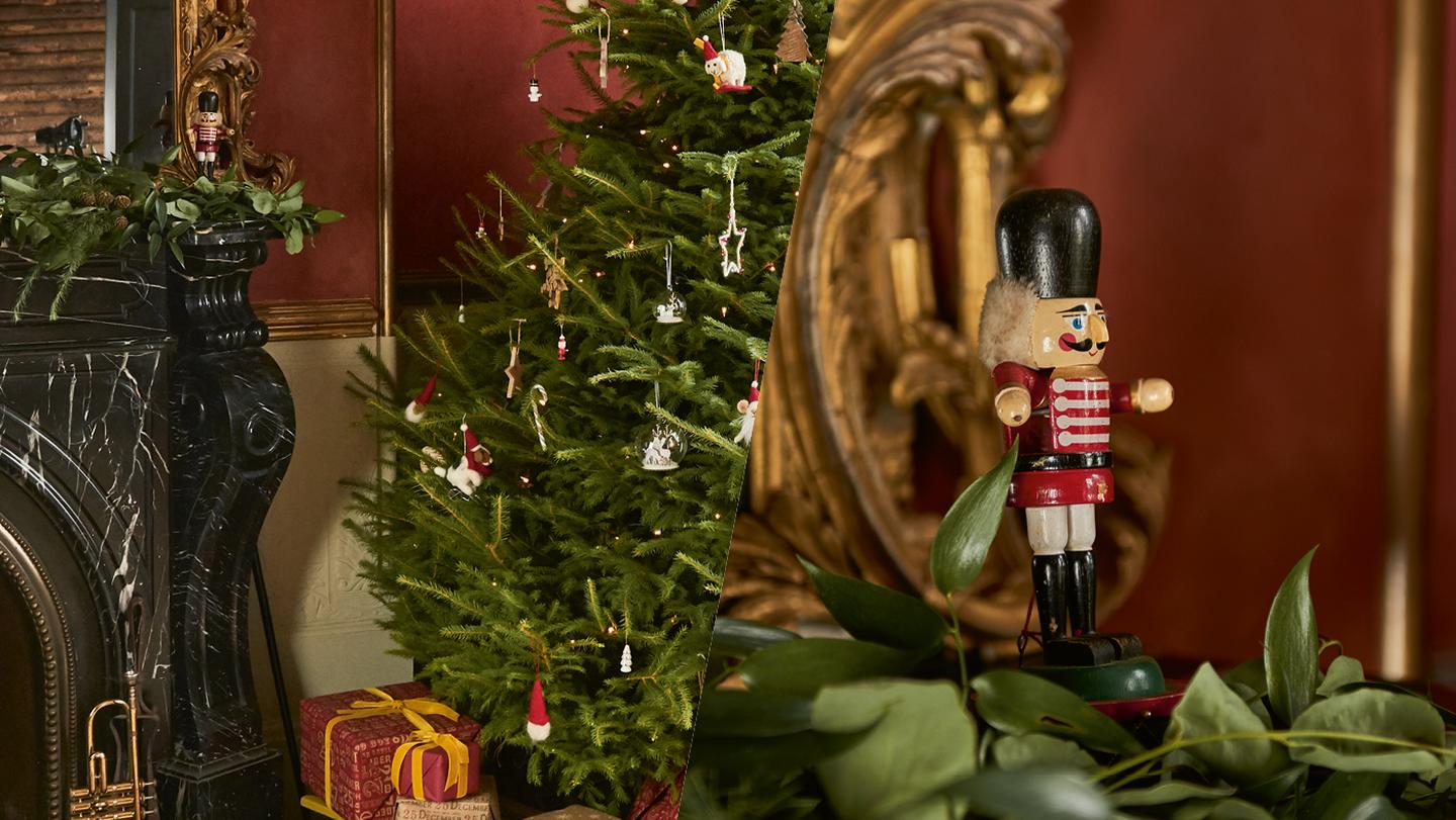 A beautifully decorated Christmas tree and traditional wooden nutcracker