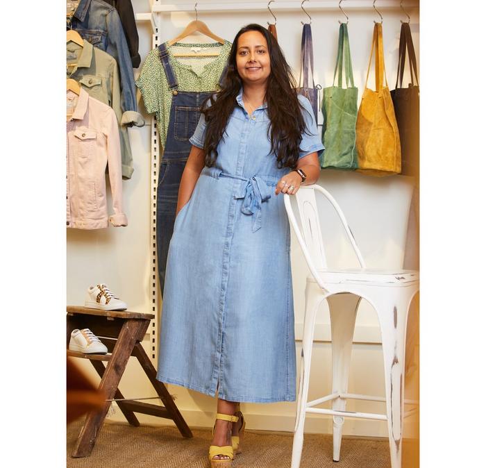 Jo, who is the Head of Retail Operations at FatFace, wears a chambray shirt dress.