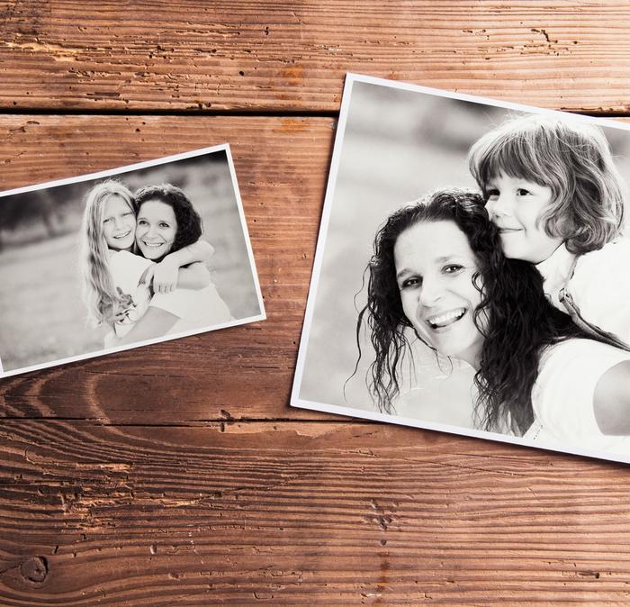 Black and white photos of a mother and daughter, ready to put into a scrapbook.