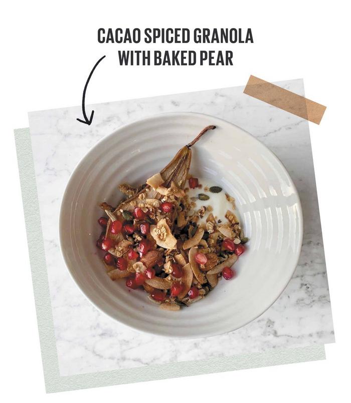 A bowl of cacao spiced granola with baked pear & pomegranate.