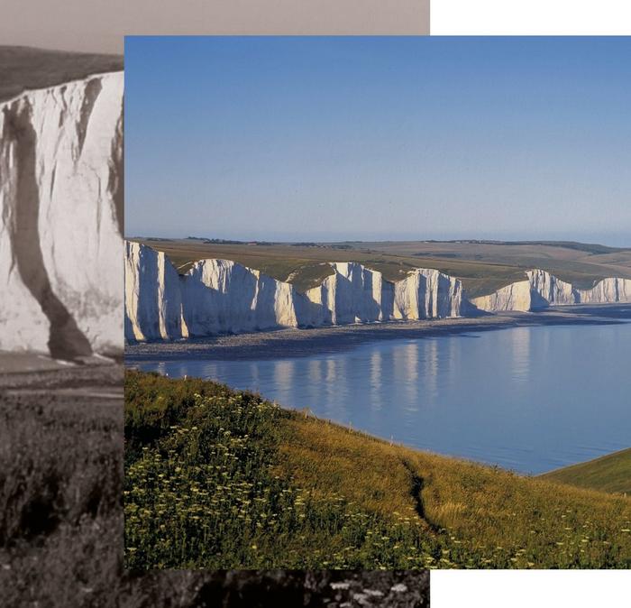 The white chalk cliffs, green grass & pure blue sea along the South Downs Way.