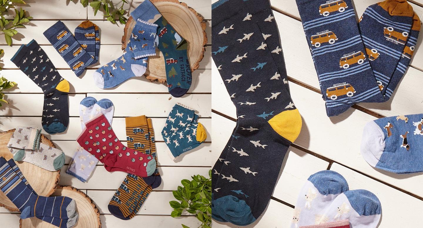 A selection of women's & men's socks in a variety of patterns; including stripes, animals, campervans & Land Rovers.