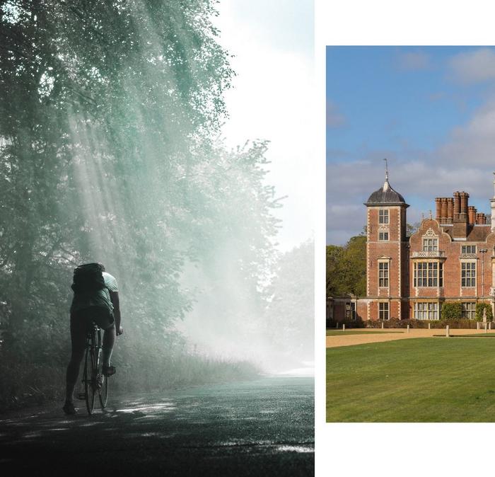 An atmospheric shot of a man in T-shirt & shorts cycling on a country road. The front of a majestic country house.