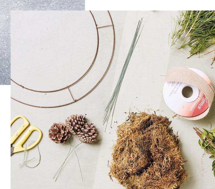 Tools & materials for making your own wreath; including scissors, wire, moss, hessian ribbon & foliage.