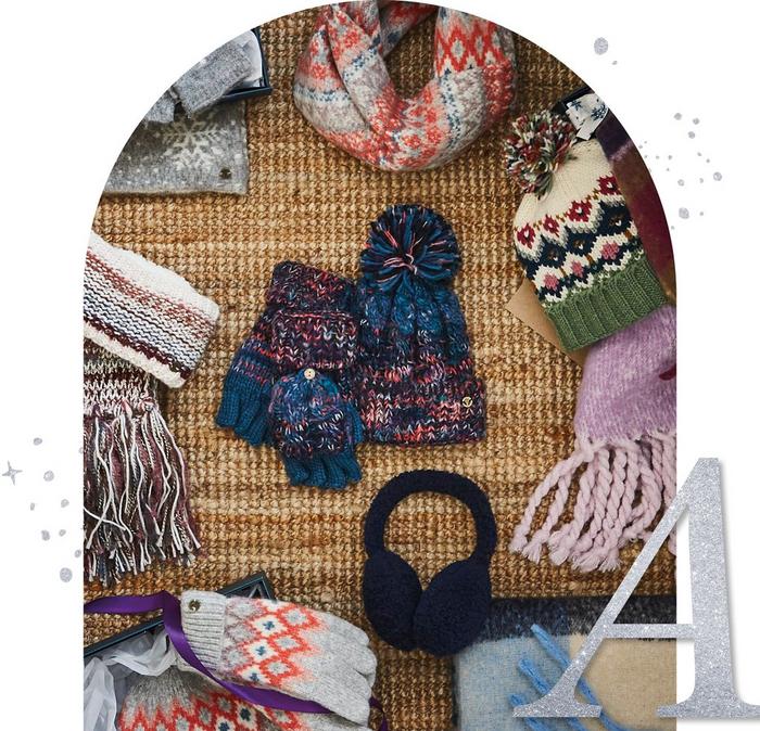 A selection of women's hats, gloves, scarves & ear muffs in a variety of colors & patterns.