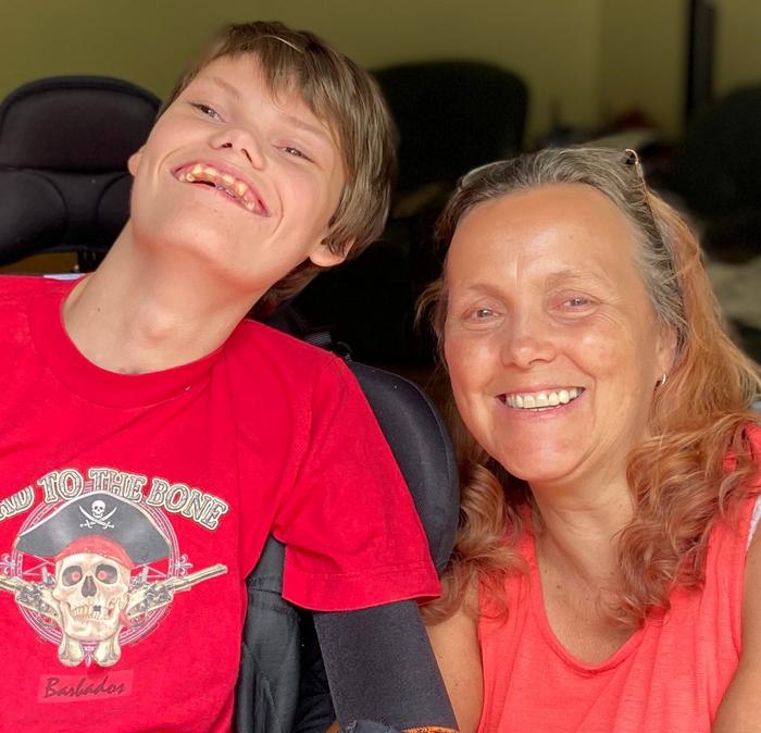 UK carer Anne and her son, who suffers from Pontocerebellar Hypoplasia type 2.