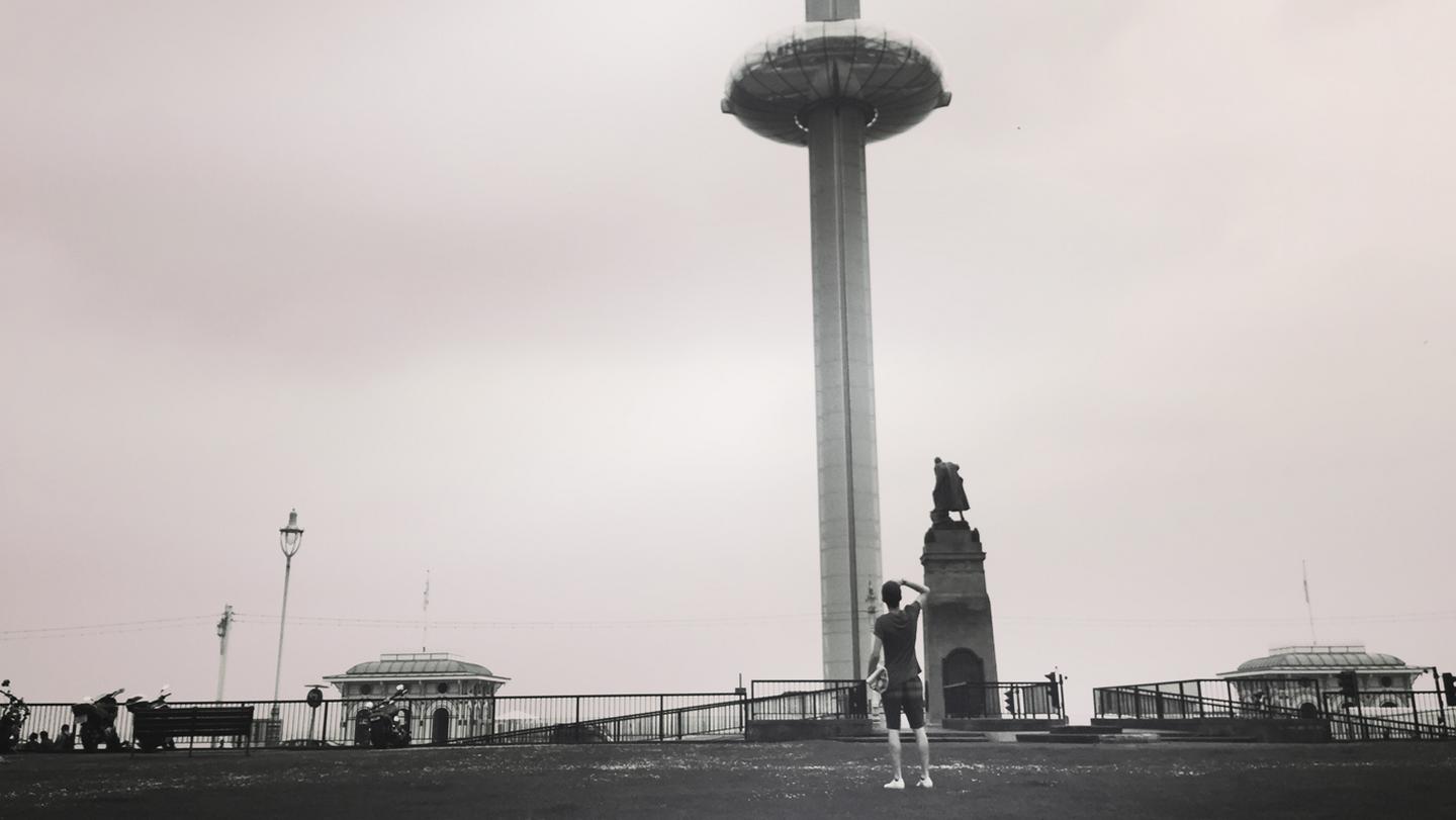 Danny from the FatFace store in Brighton, looking up to the i360 - which the locals call the 'spaceship'