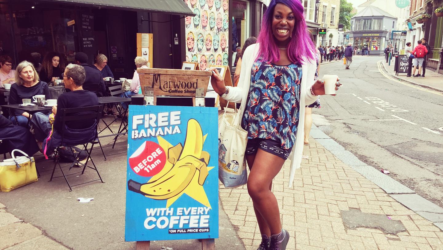 Ebony from the FatFace Brighton store, wearing her FatFace clothes outside one of her favourite coffee shops, Marwood