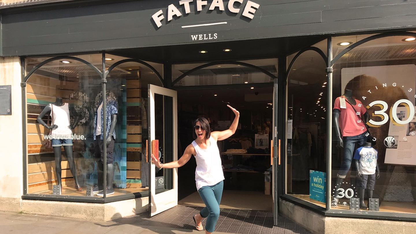Leah, store manager at FatFace Wells, posing outside the store in FatFace clothes