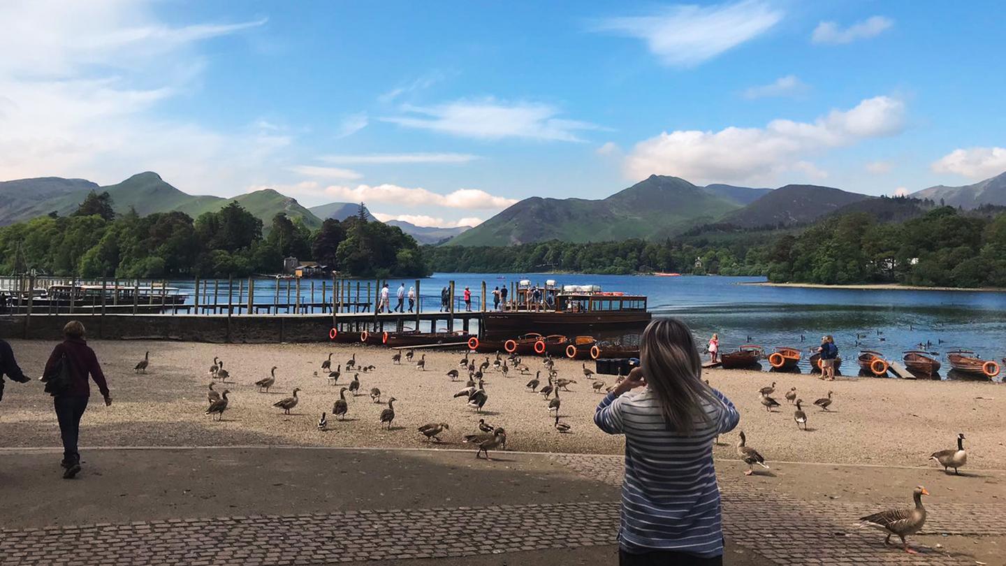 Ellie from the FatFace store at Keswick takes a picture of all the birds and wildlife you can see from the water