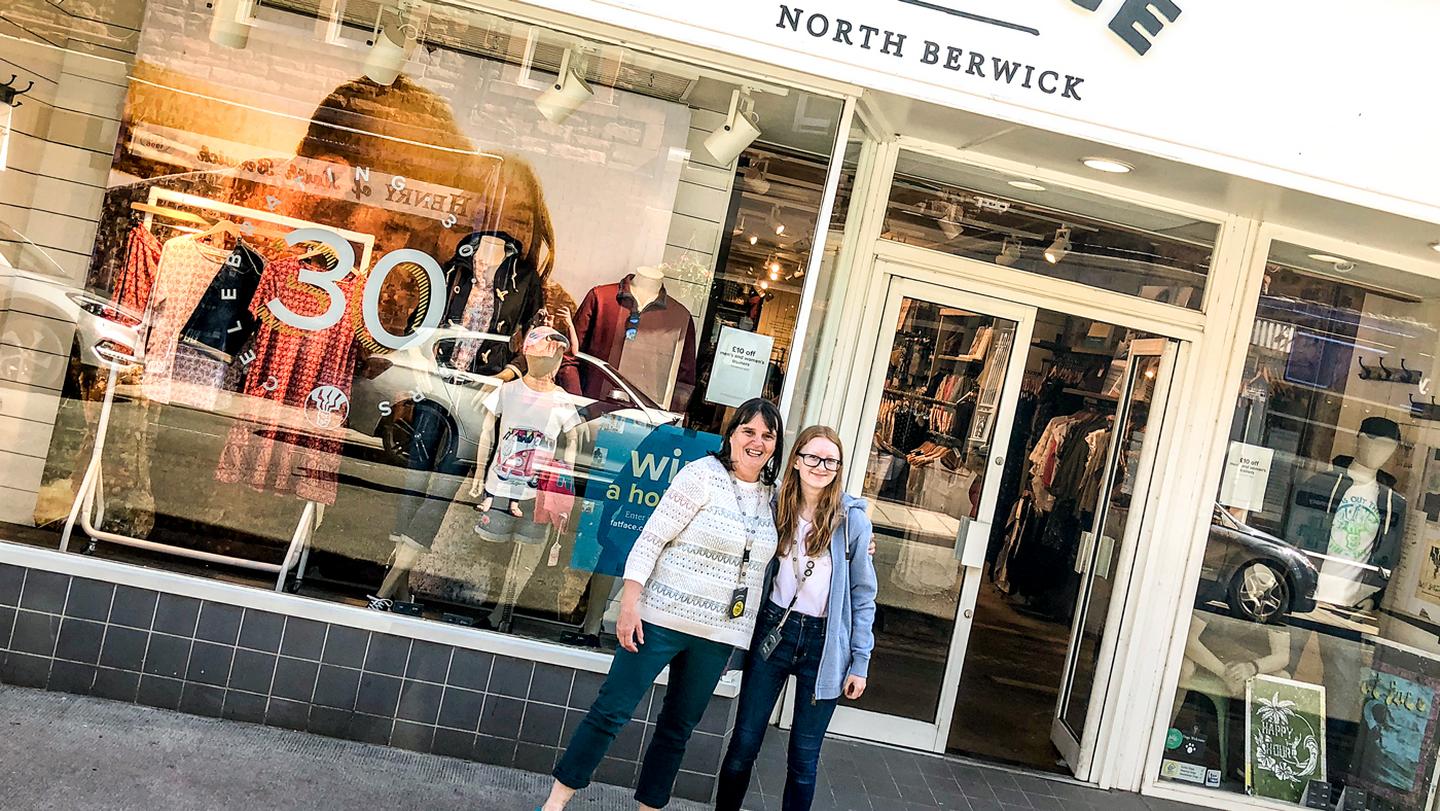 Carol and Sarah, who work at the North Berwick FatFace store, pose in FatFace clothes outside their store