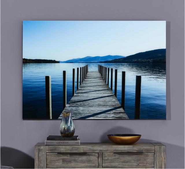 Blue bedroom idea – wall art of jetty