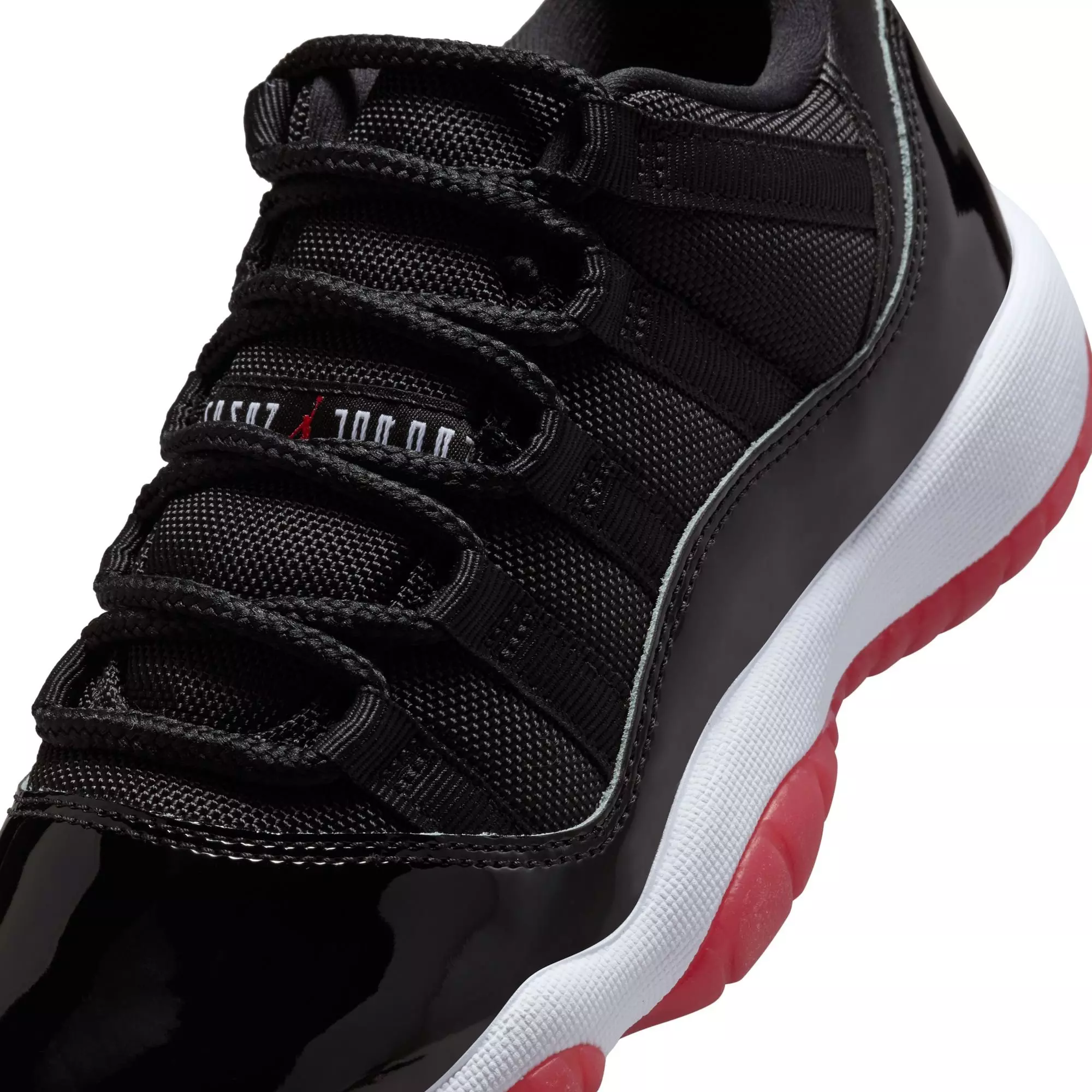 Jordan 11 Retro Low "Bred" Grade School Kids' Shoe - BLACK/VARSITY RED/WHITE