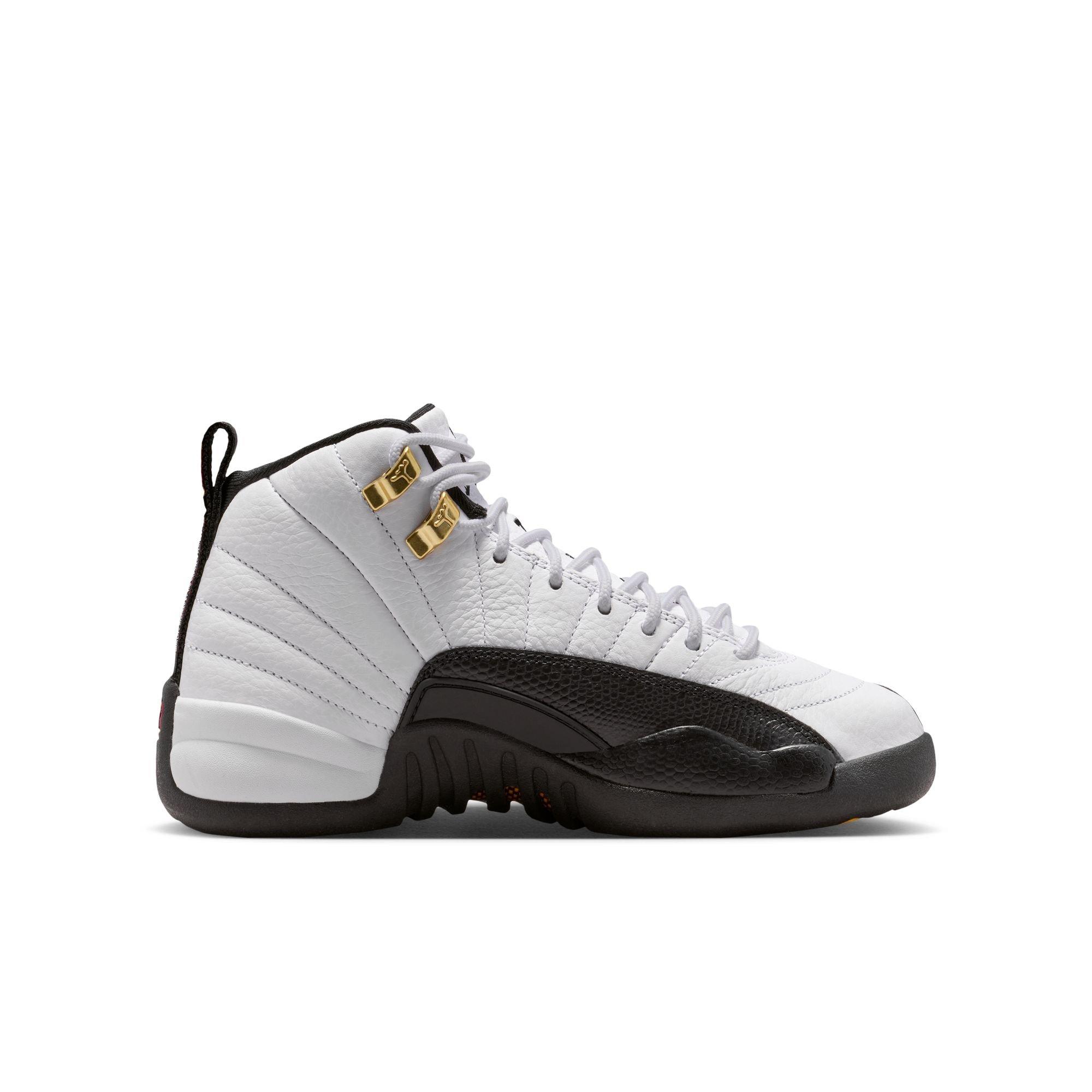 Jordan 12 Retro Grade School Kids' "Taxi" Shoe