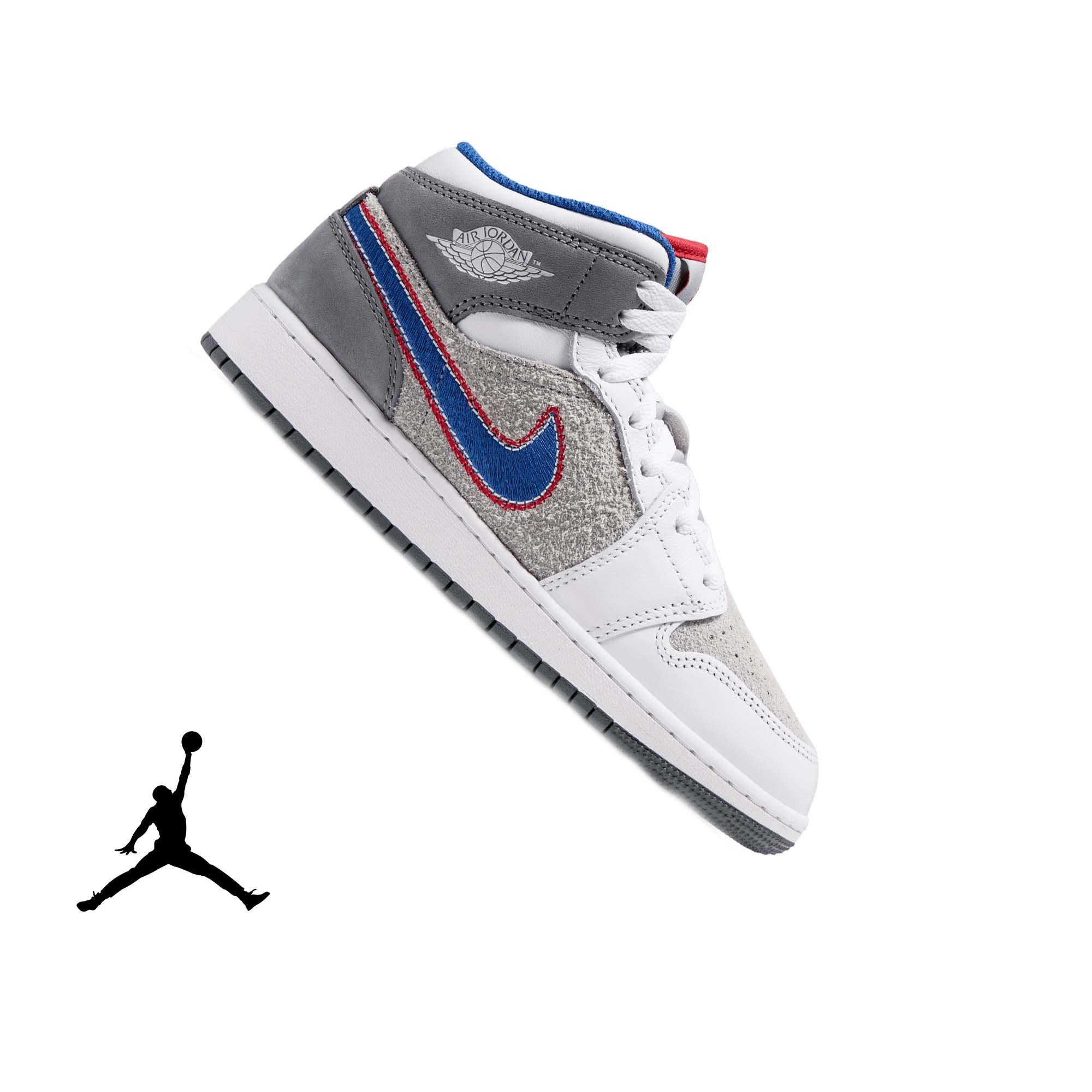 Jordan 1 Mid SE "Hare" Grade School Kids' Shoe - LT SMOKE GREY/VARSITY ROYAL