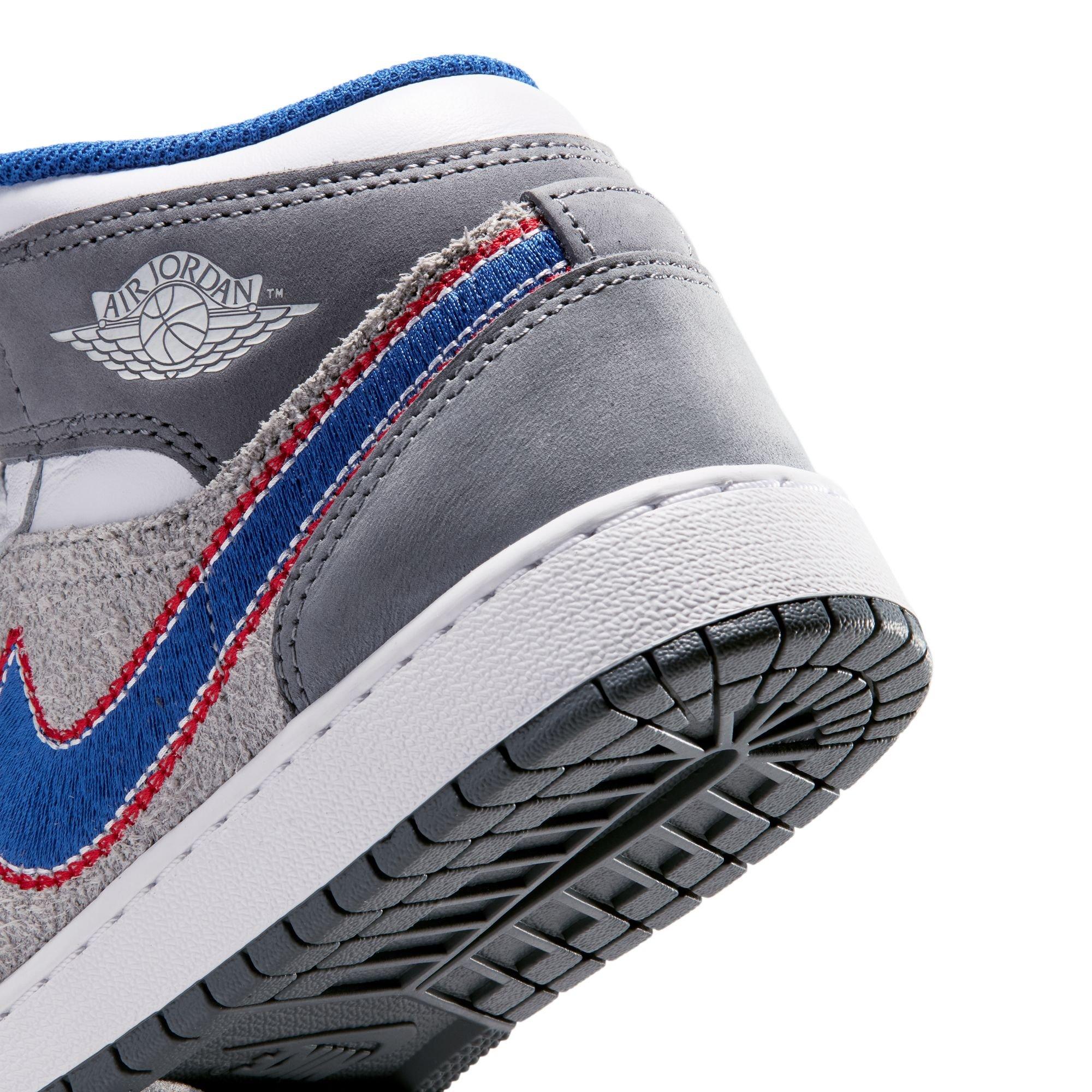 Jordan 1 Mid SE "Hare" Grade School Kids' Shoe - LT SMOKE GREY/VARSITY ROYAL
