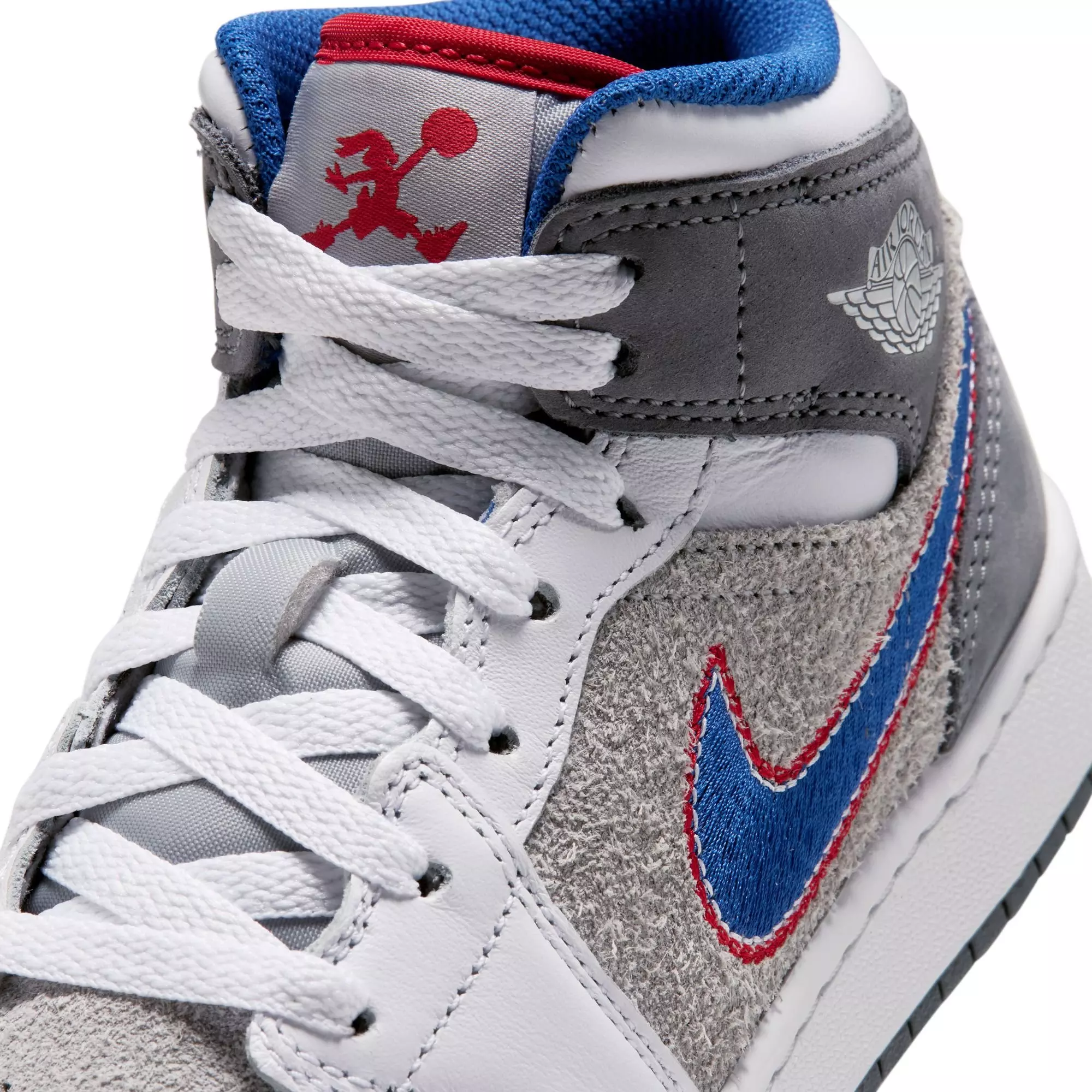 Jordan 1 Mid SE "Hare" Grade School Kids' Shoe - LT SMOKE GREY/VARSITY ROYAL