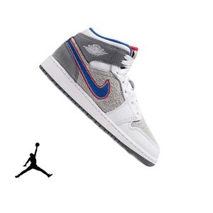 Jordan 1 Mid SE "Hare" Grade School Kids' Shoe - LT SMOKE GREY/VARSITY ROYAL