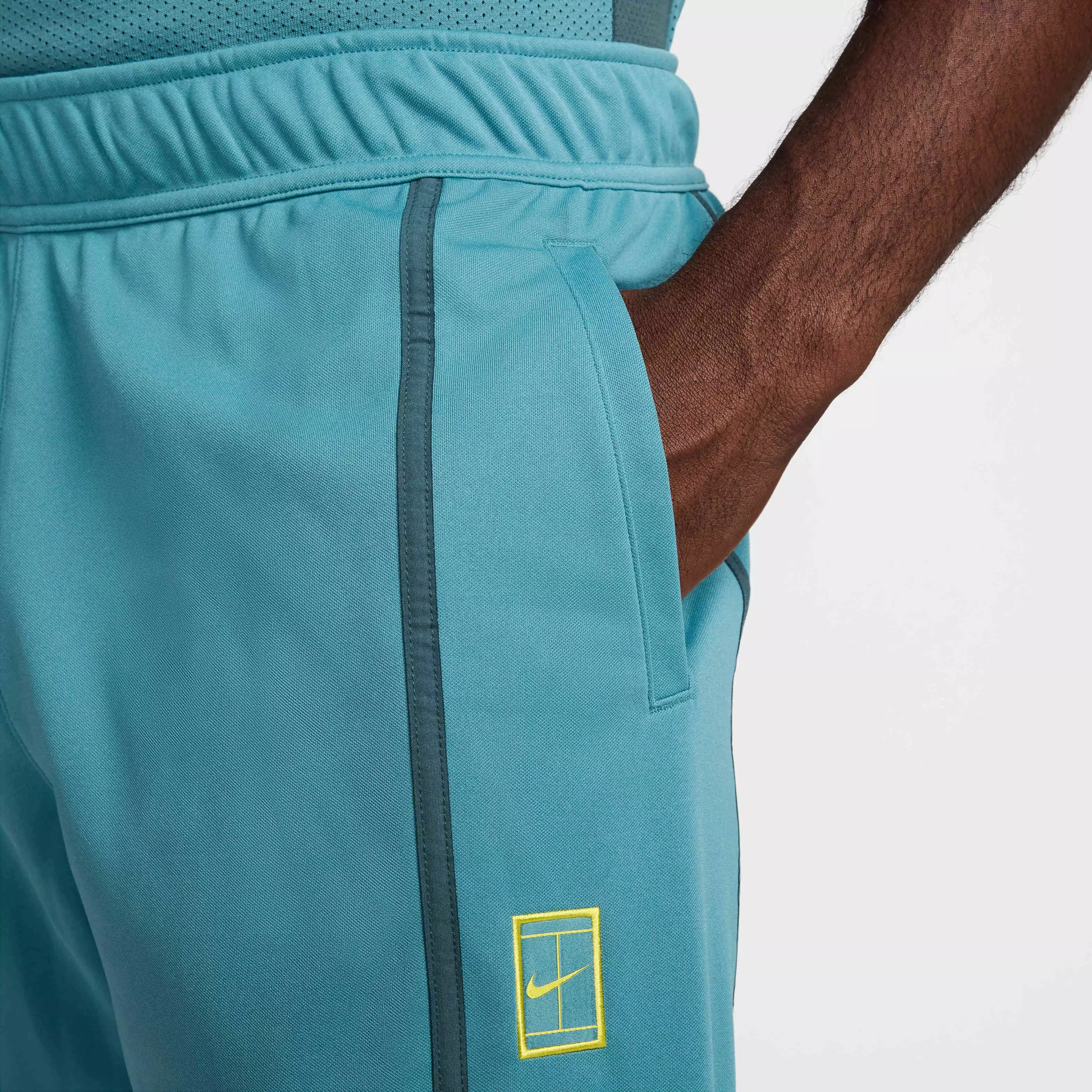 NikeCourt Men's Heritage Suit Tennis Pants - TEAL