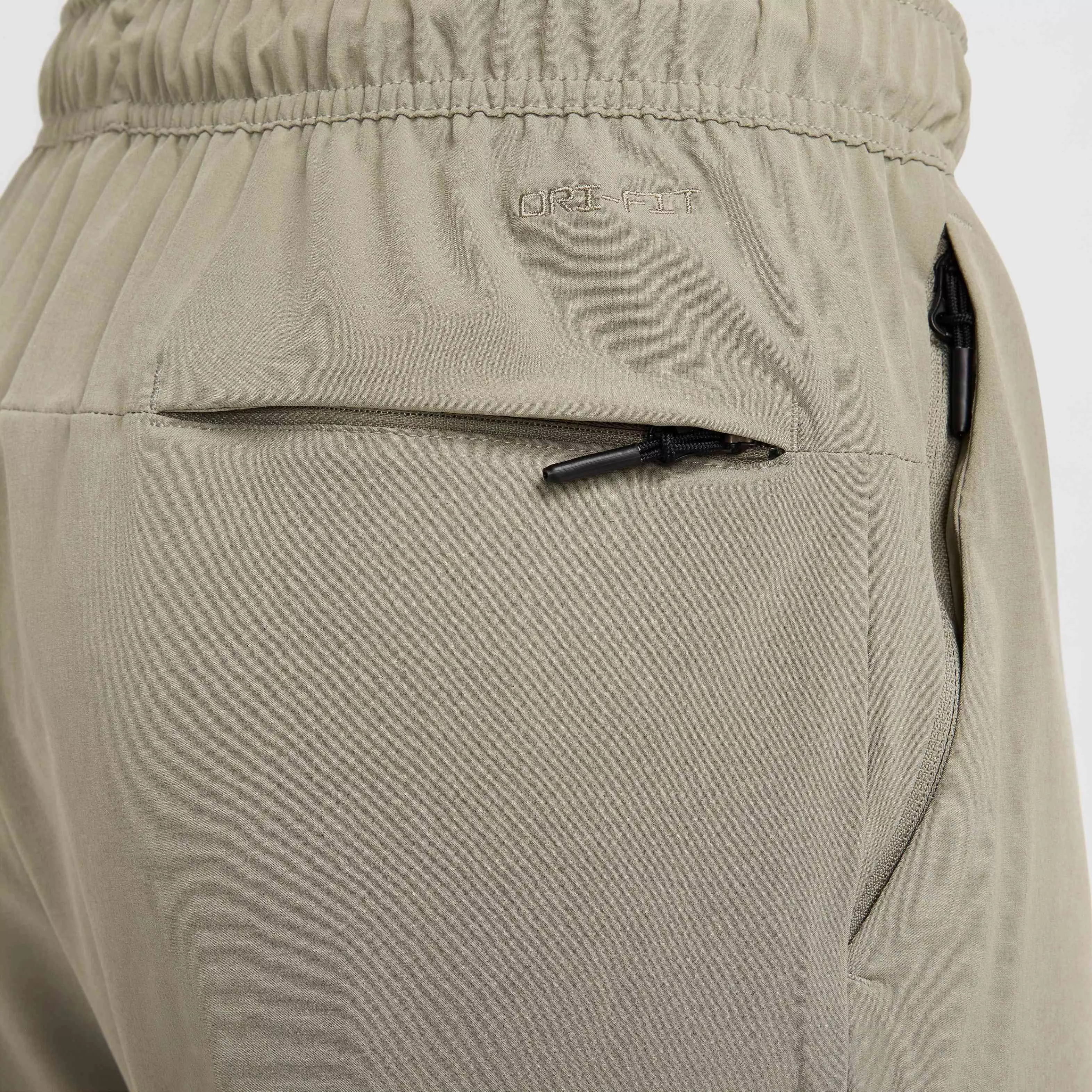 Nike Men's Unlimited Dri-FIT Tapered Leg Versatile Pants - GREEN