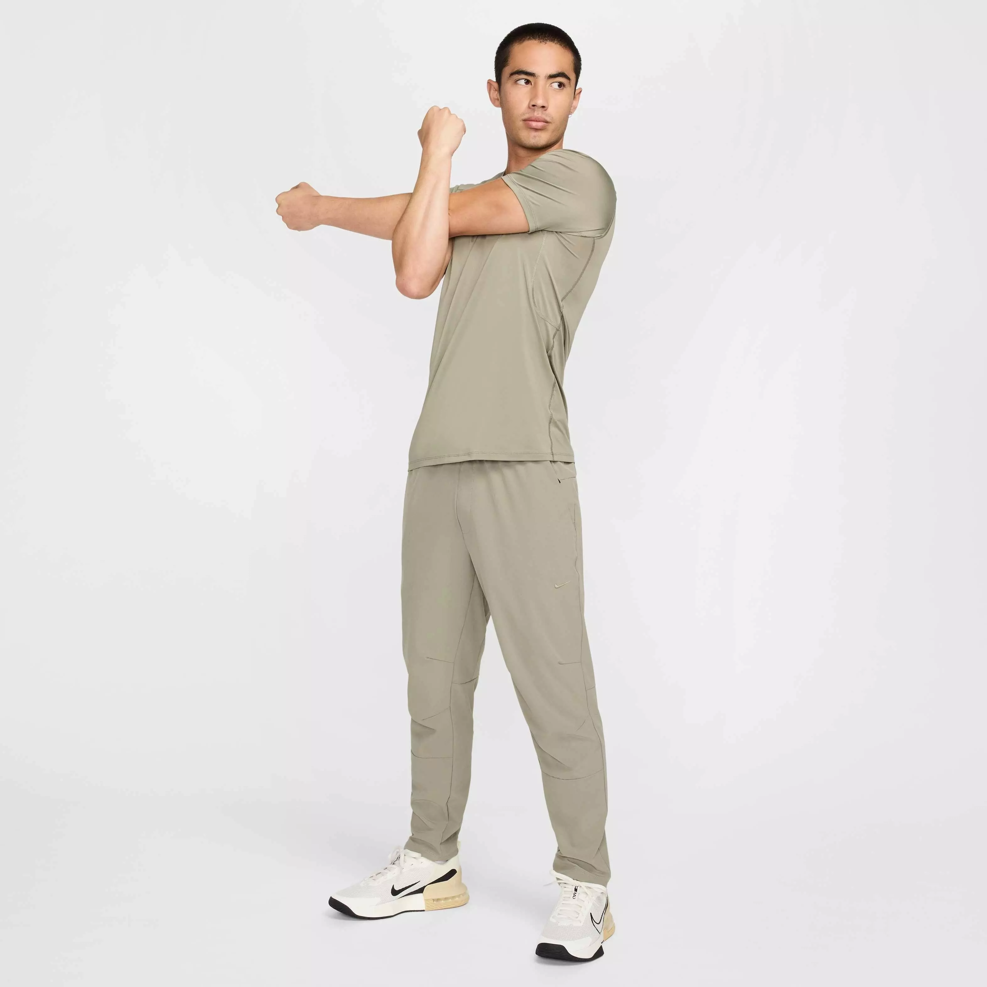 Nike Men's Unlimited Dri-FIT Tapered Leg Versatile Pants - GREEN