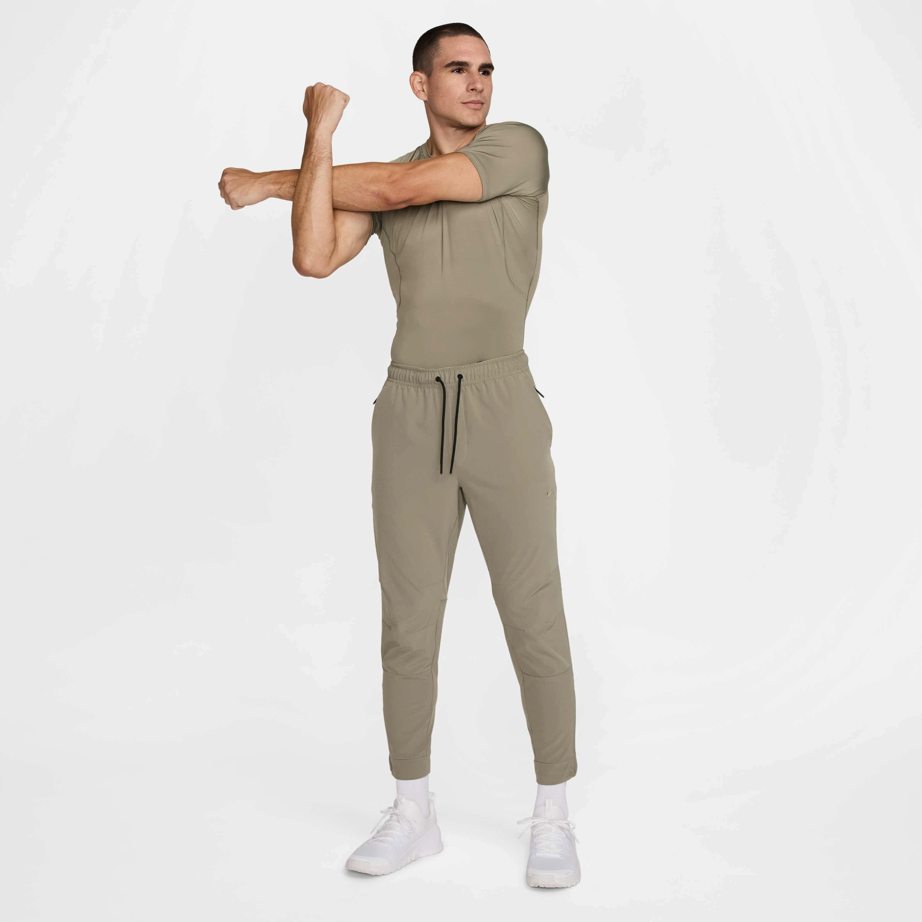 Nike Men's Unlimited Dri-FIT Zippered Cuff Versatile Pants - GREEN Thumbnail View 7