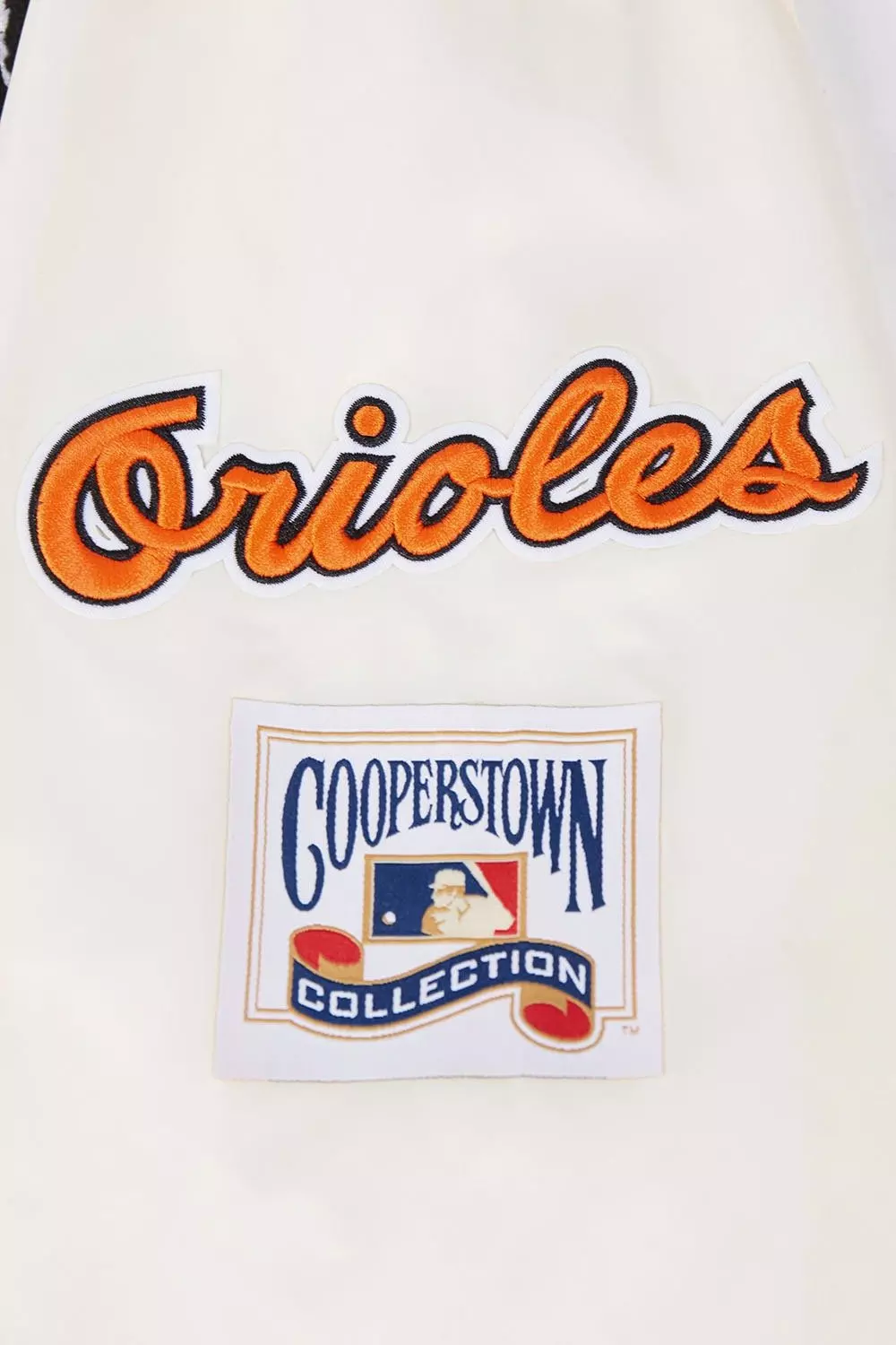 Pro Standard Men's MLB Baltimore Orioles Retro Classic Rib Satin Jacket - Eggshell/Black - EGGSHELL/BLACK