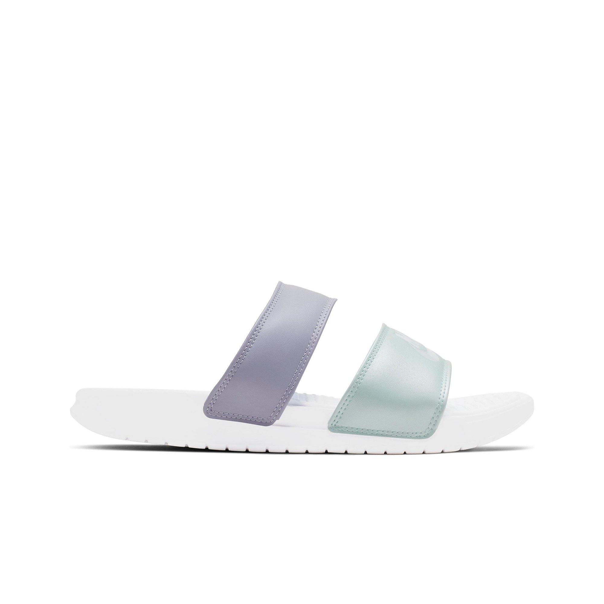 purple and white nike slides