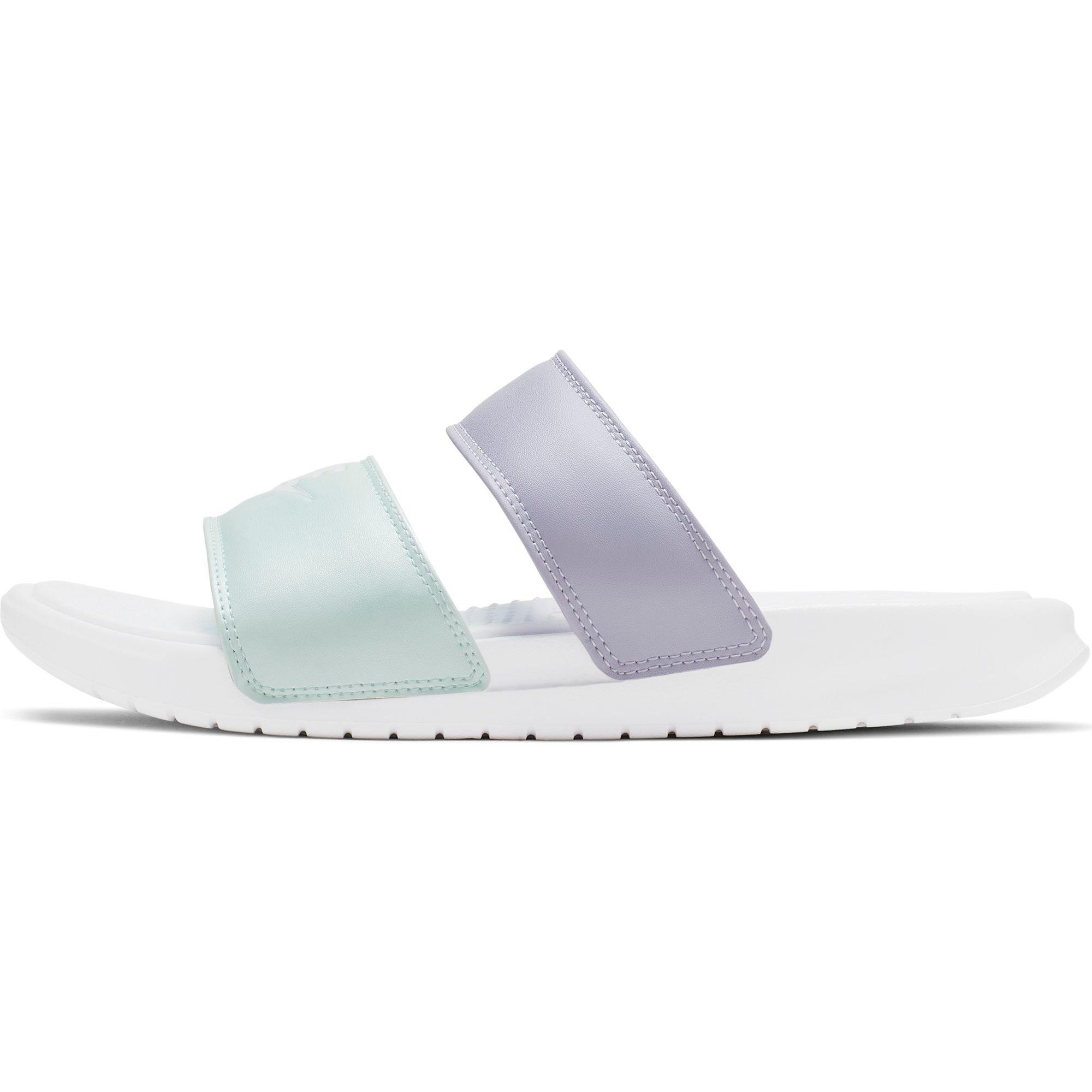 purple and white nike slides