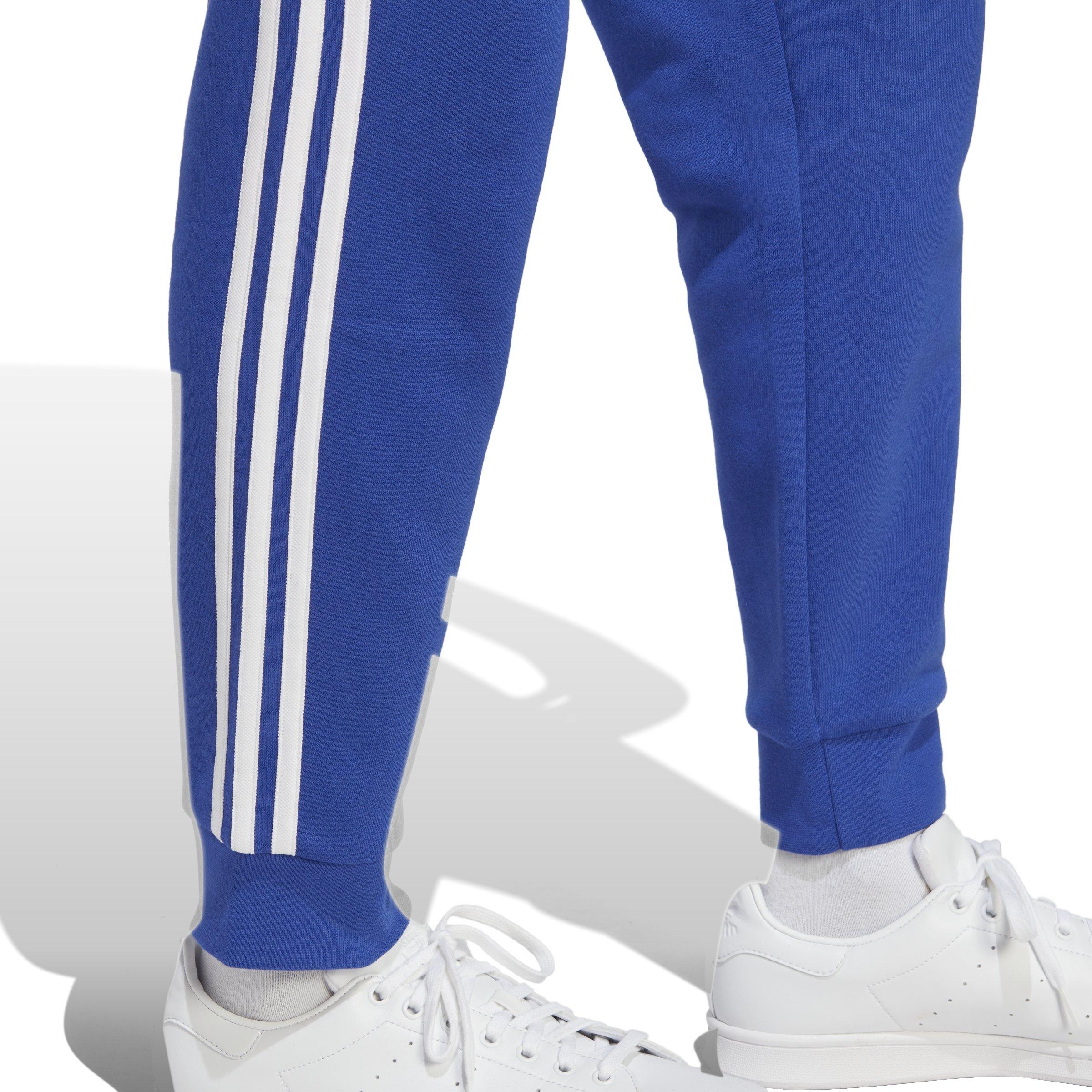 adidas Originals adicolor three stripe track pants in blue