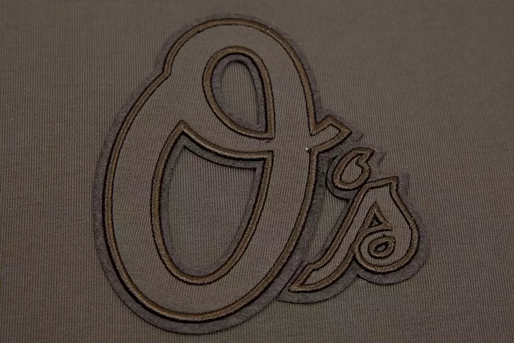 Pro Standard Men's MLB Baltimore Orioles Neutral Drop Shoulder Top - DK BROWN