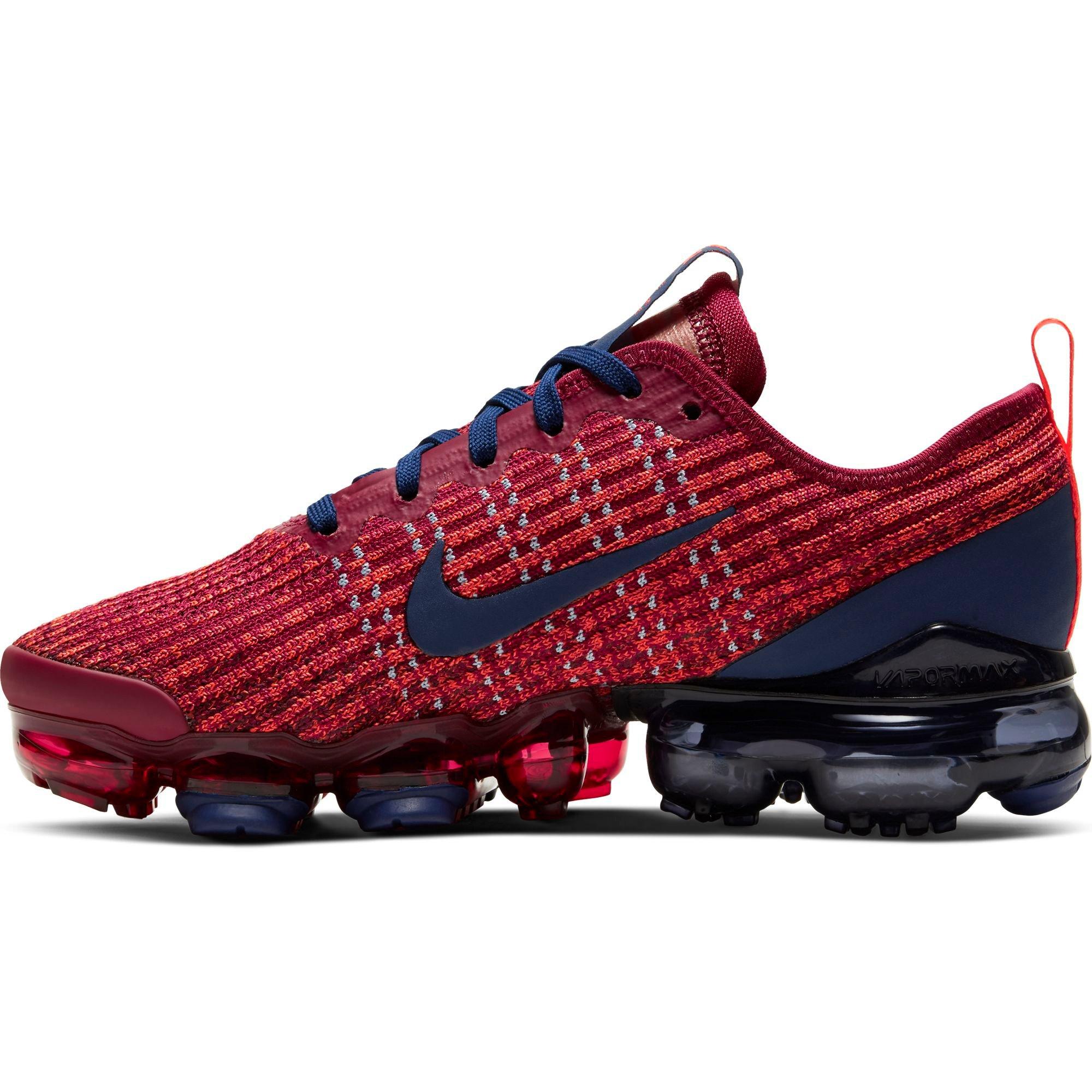 red vapormax plus grade school