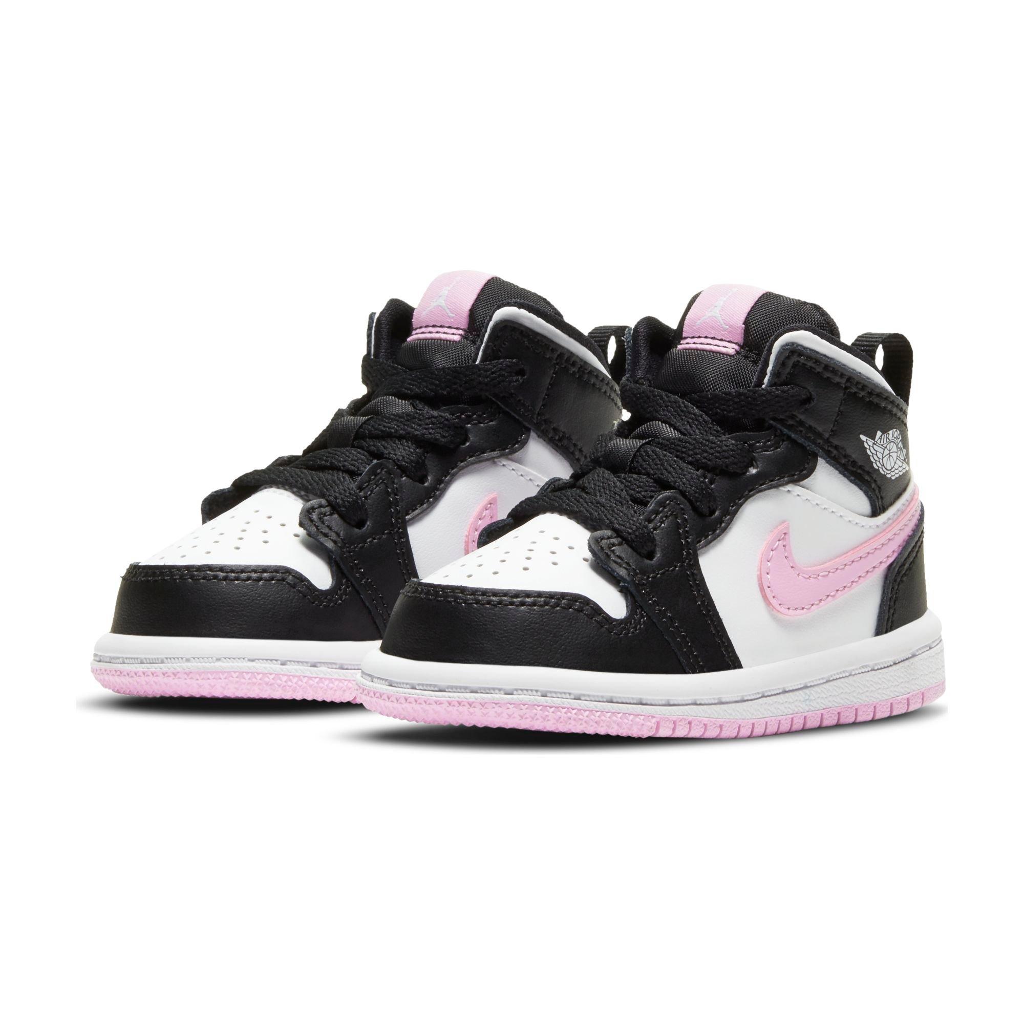 pink and black baby jordans