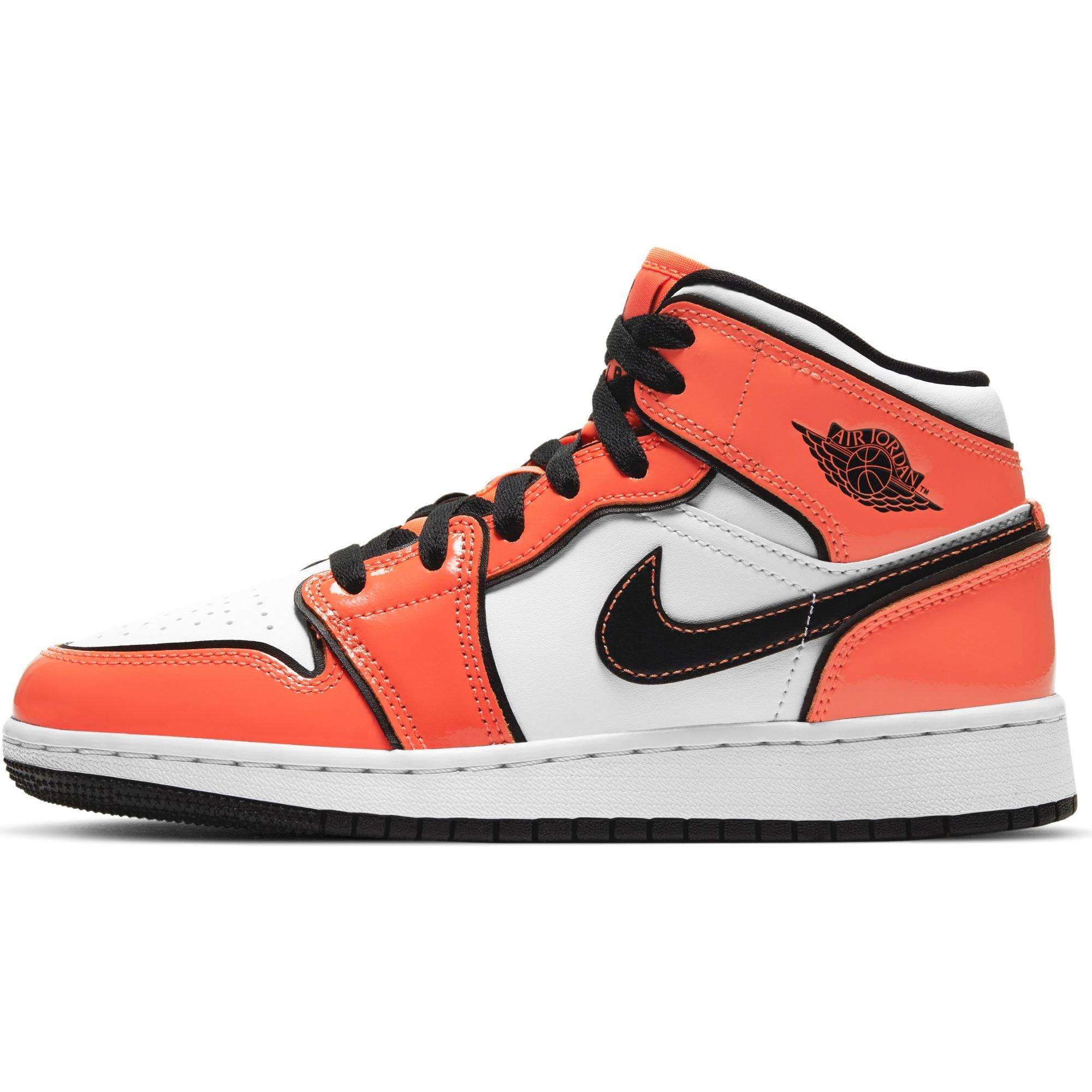 orange jordan 1 mid grade school