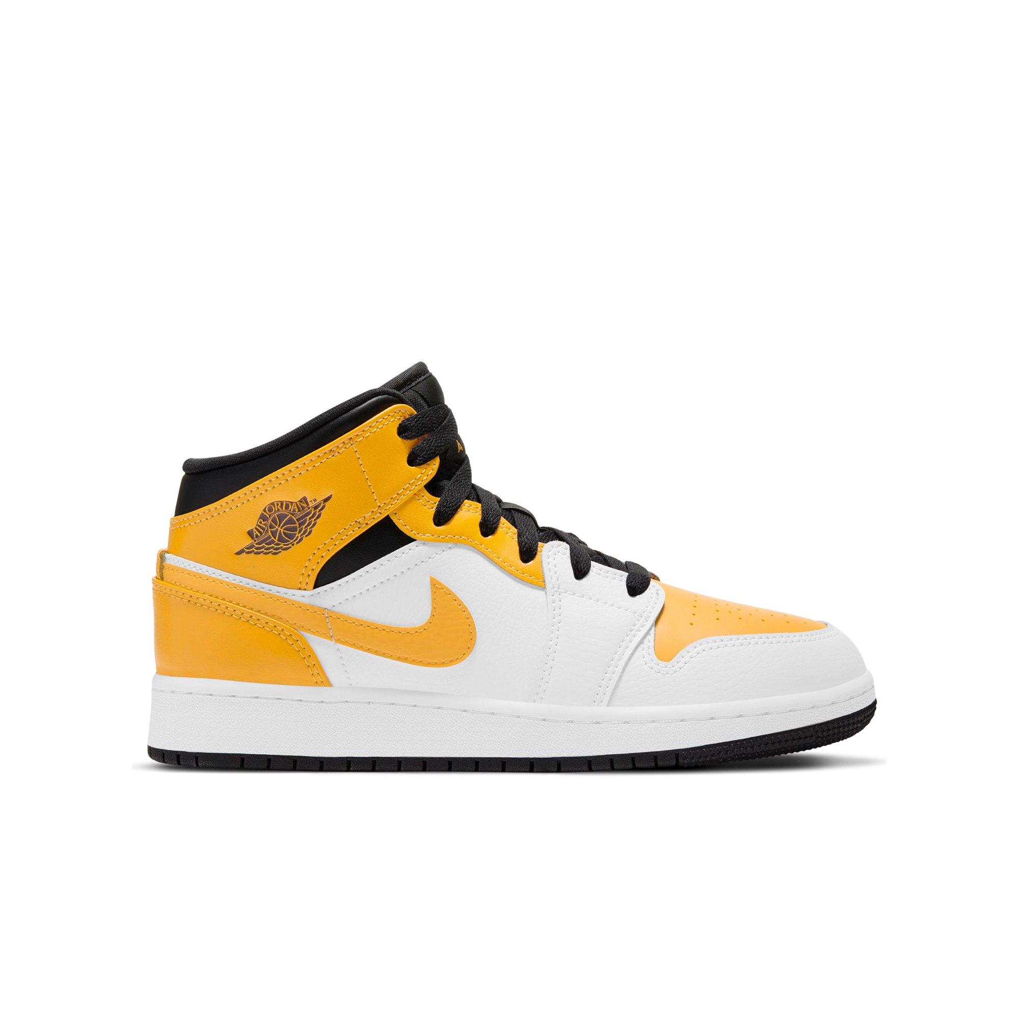 grade school yellow and black jordan 1