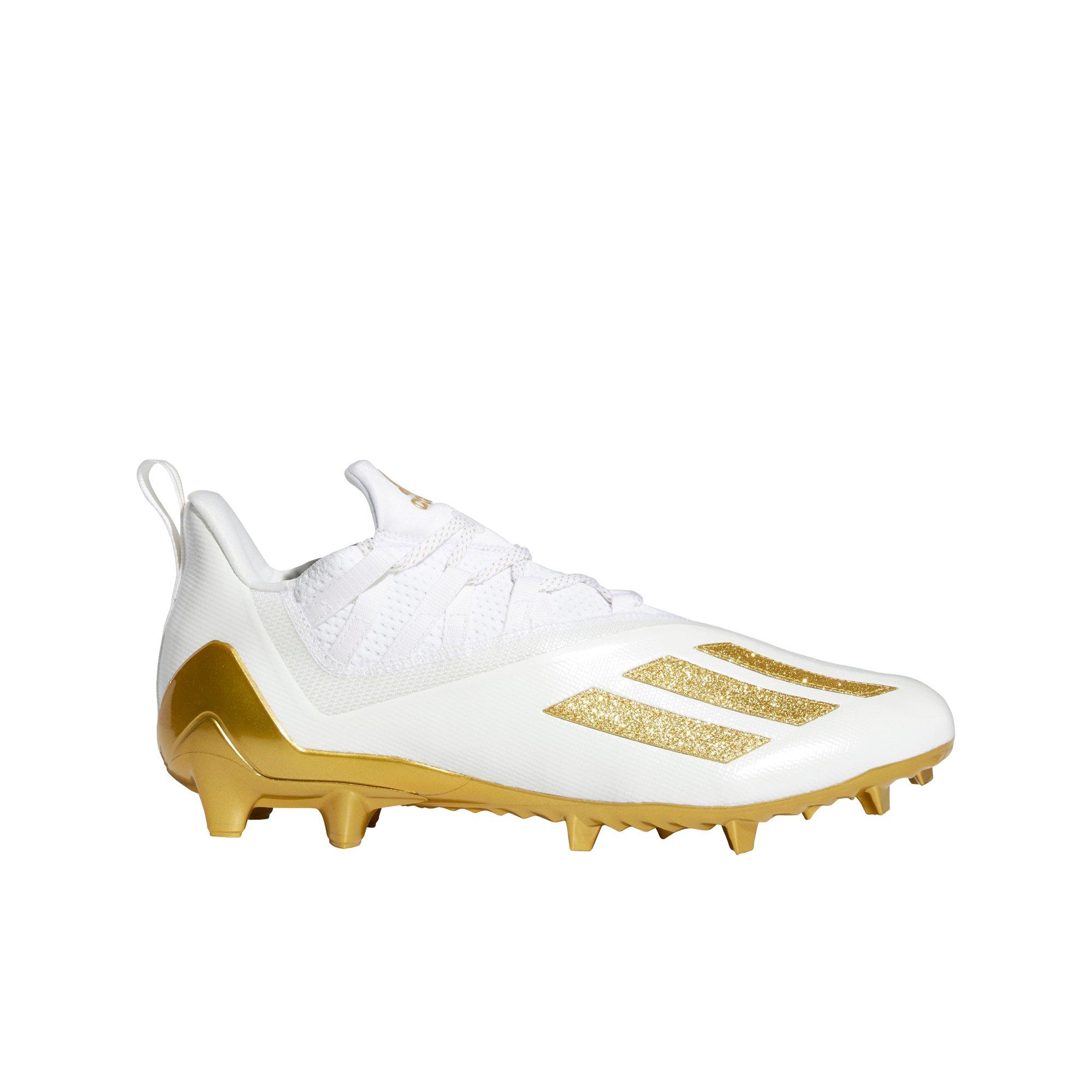 white and gold nike vapor cleats