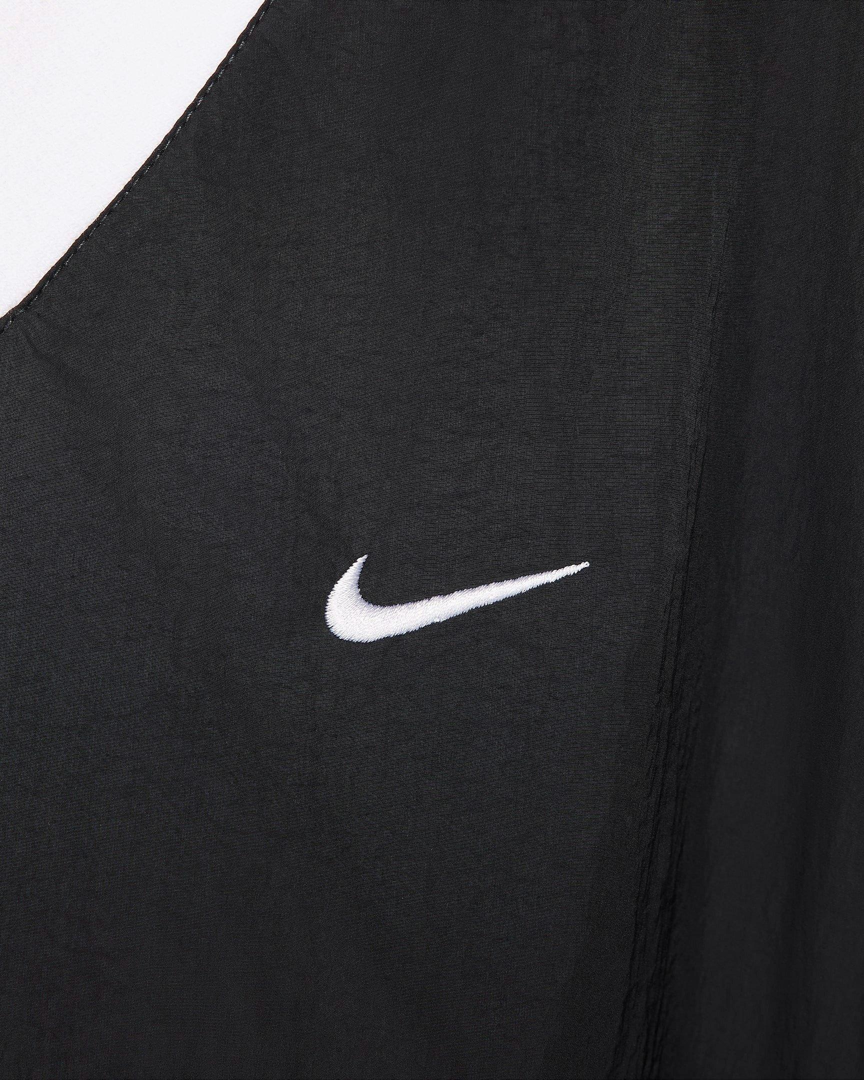 Nike Women's Sportswear Essential Loose UV Woven Long Sleeve V-Neck Top - BLACK Thumbnail View 4
