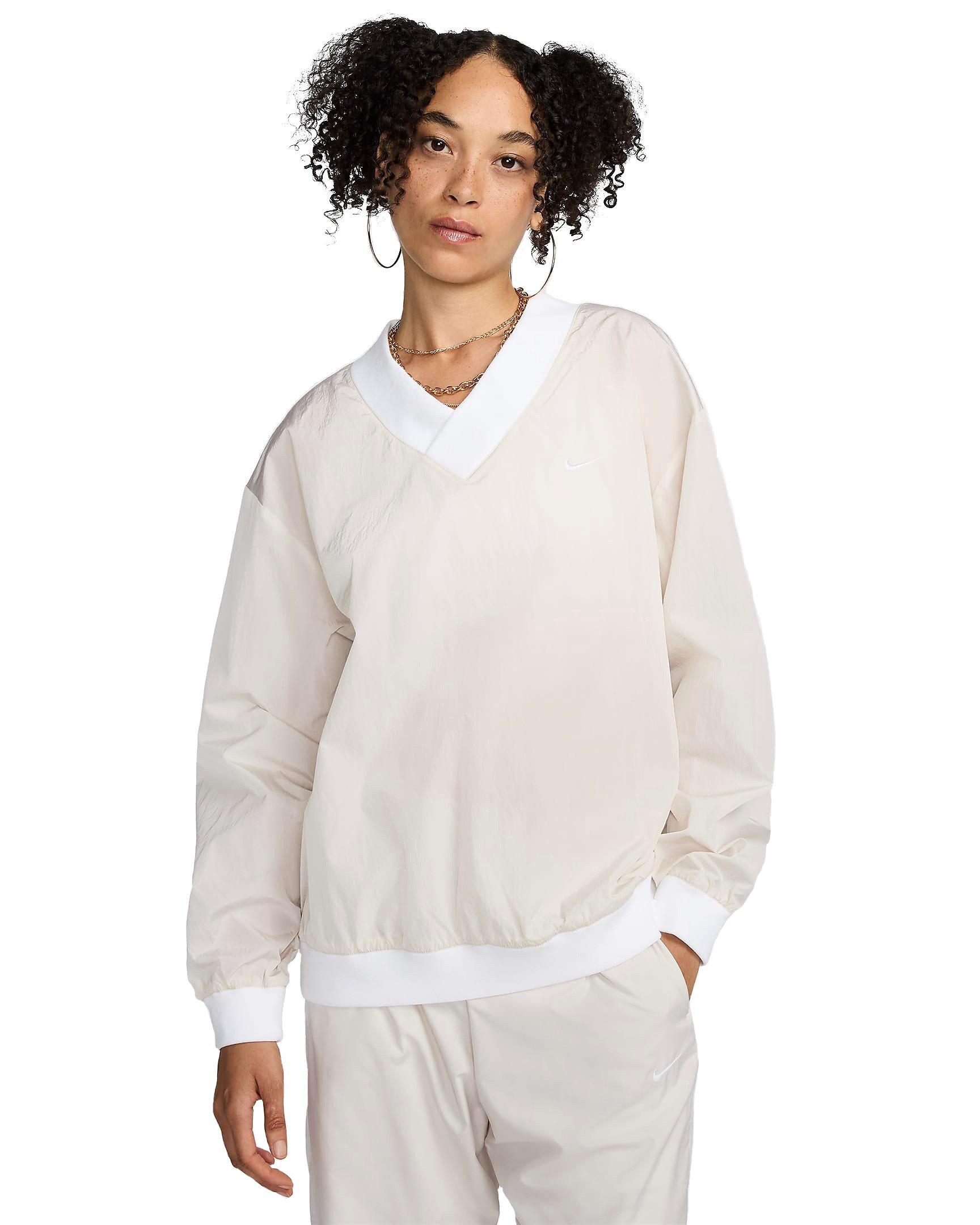 Nike Women's Sportswear Essential Loose UV Woven Long Sleeve V-Neck Top - BROWN Thumbnail View 1