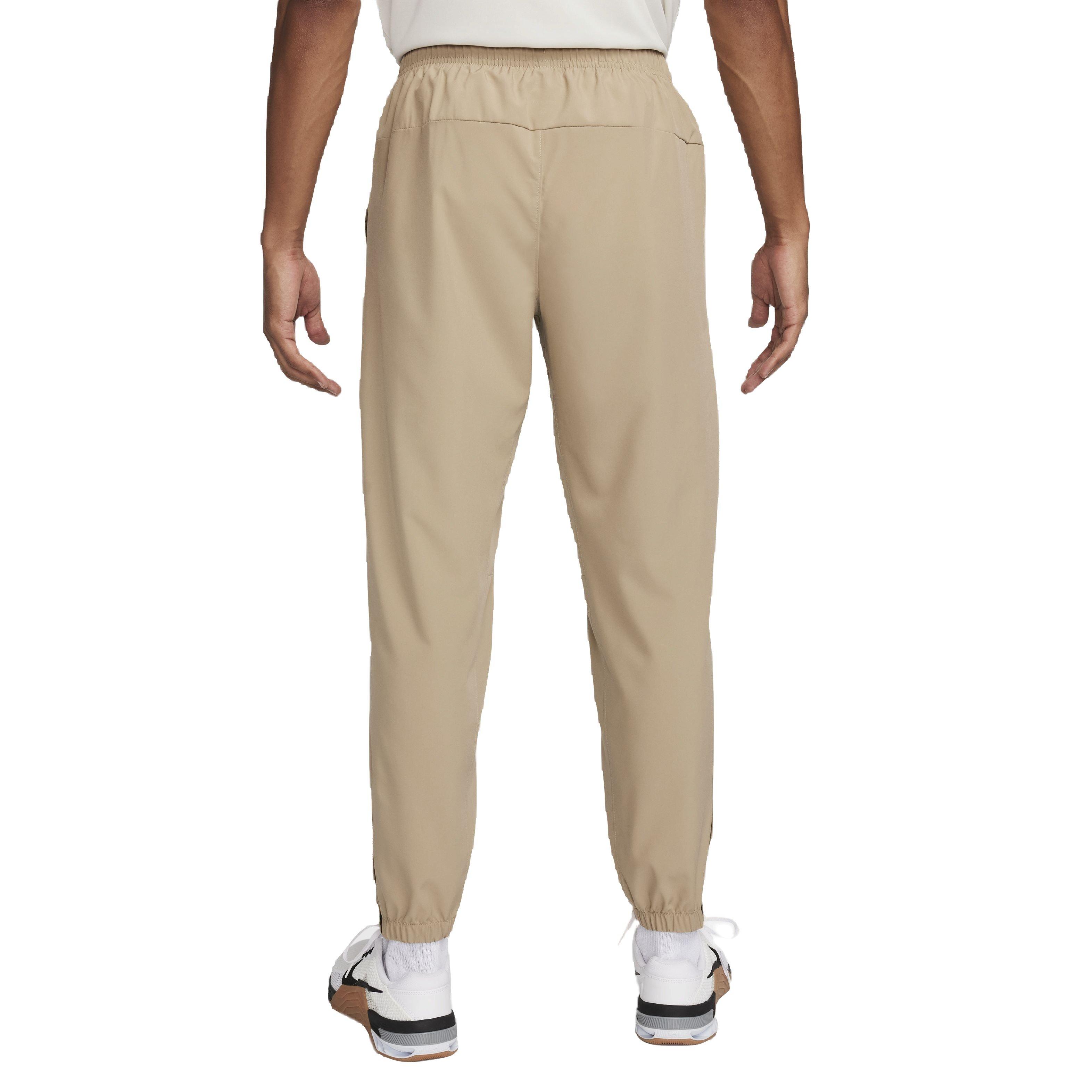 Nike Form Men's Dri-FIT Tapered Versatile Trousers. Nike CA