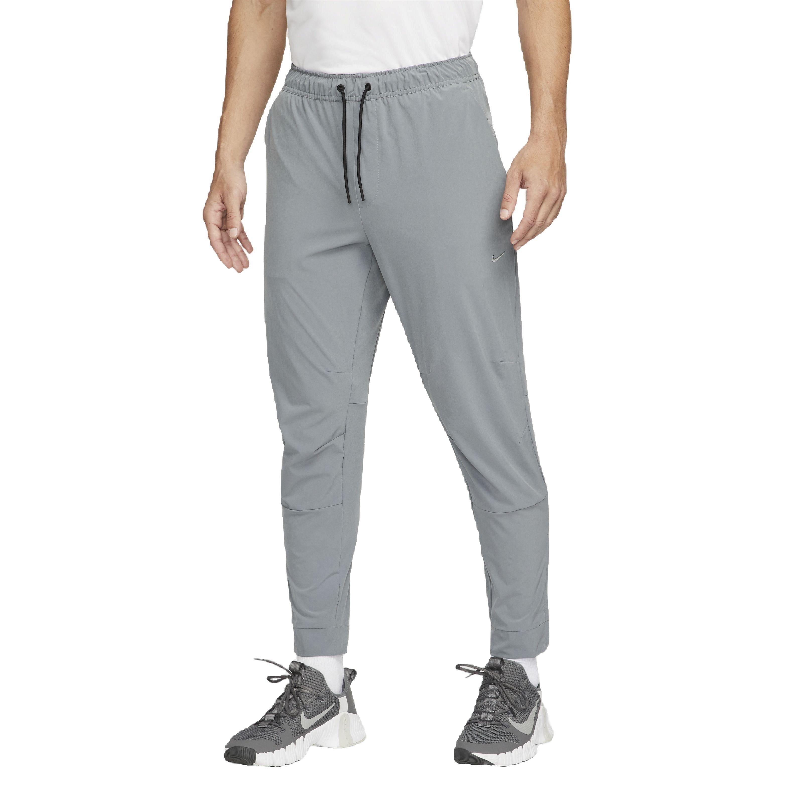 Nike Men's Dri-FIT Unlimited Zippered Cuff Versatile Pants - GREY Thumbnail View 1