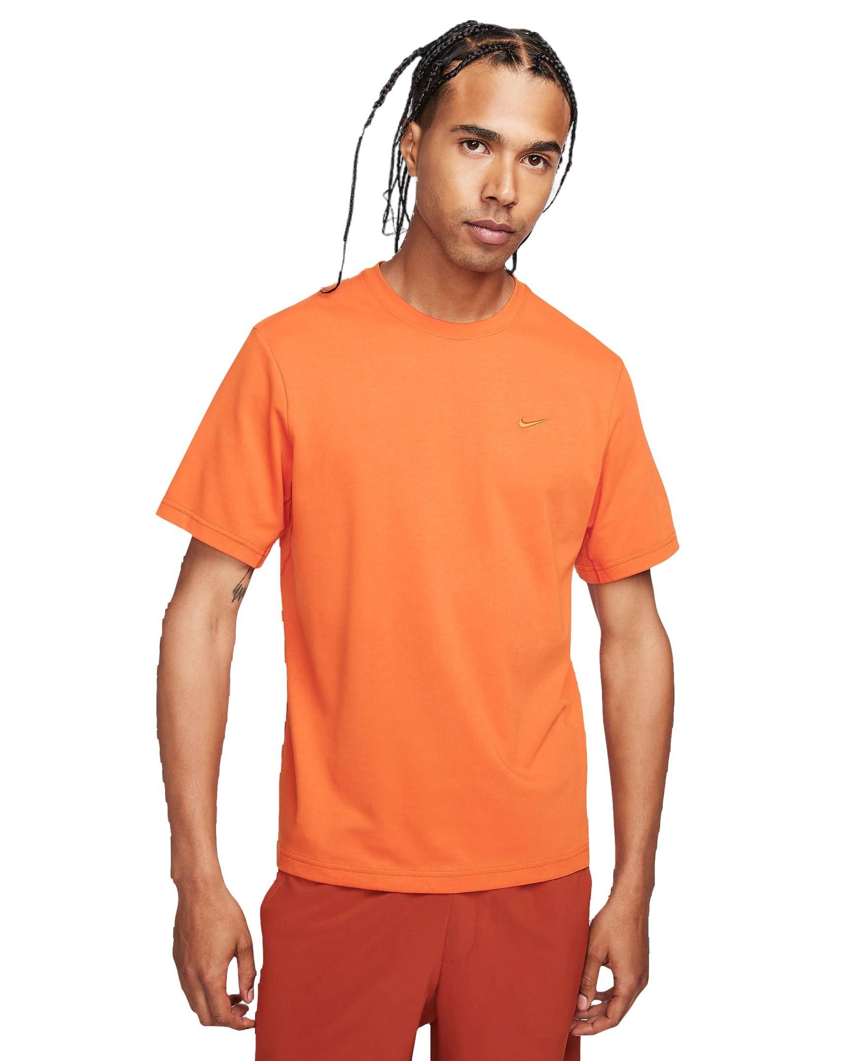 Nike Men's Dri-FIT Primary Statement Short Sleeve Versatile Top - ORANGE Thumbnail View 1