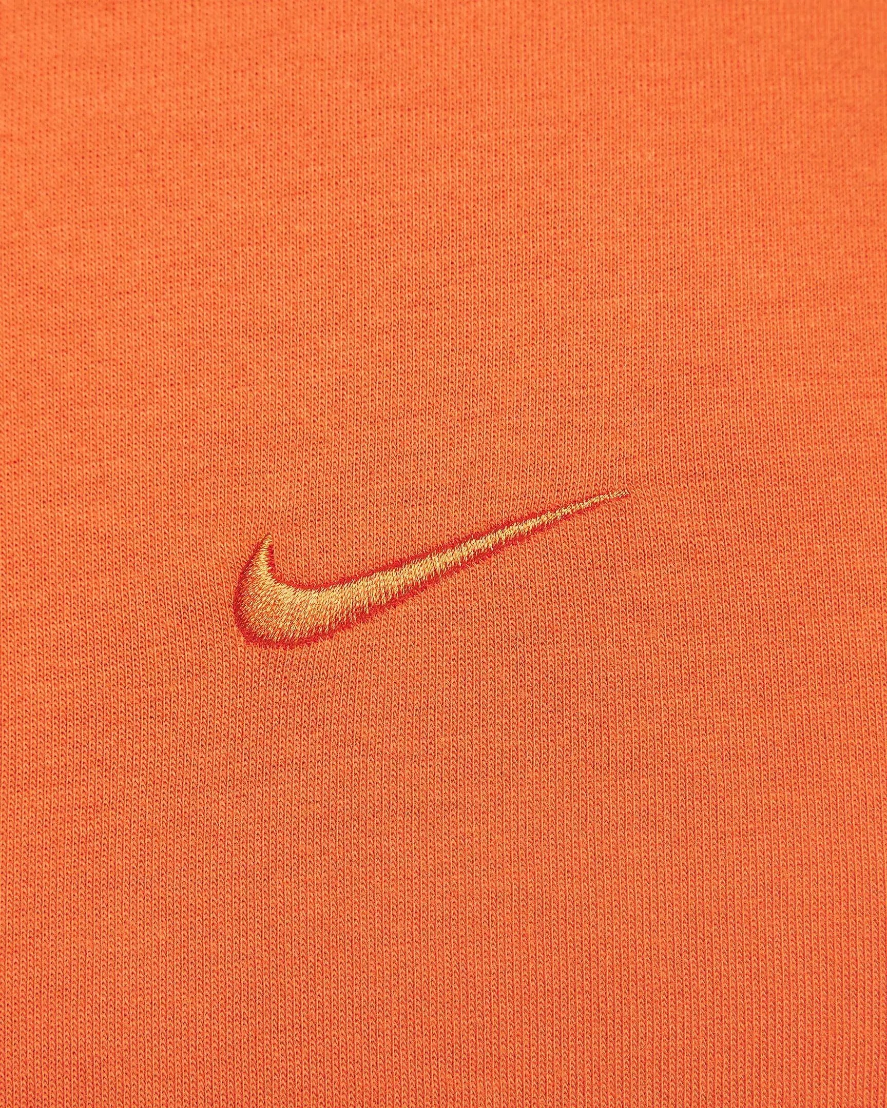 Nike Men's Dri-FIT Primary Statement Short Sleeve Versatile Top - ORANGE