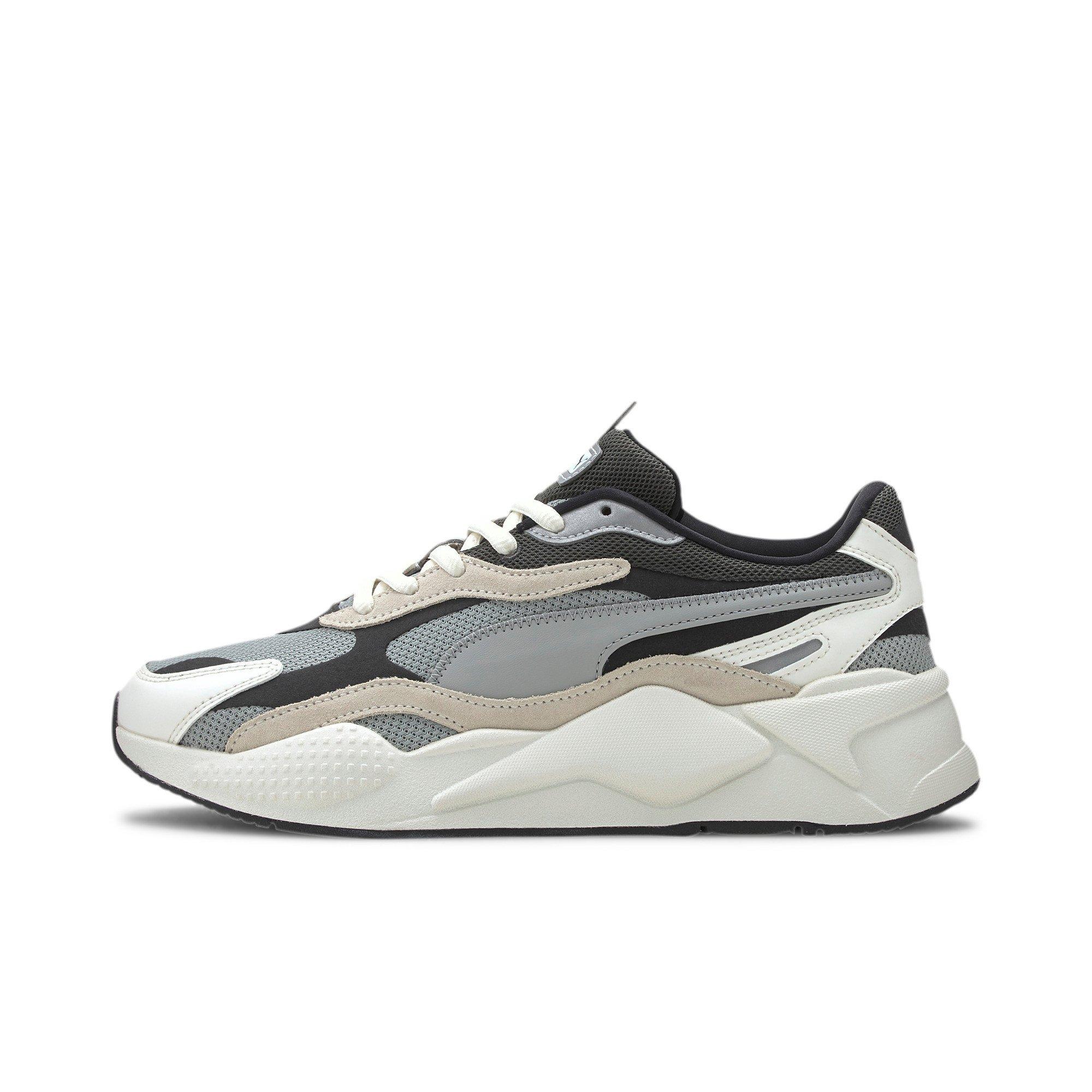 black white and grey pumas